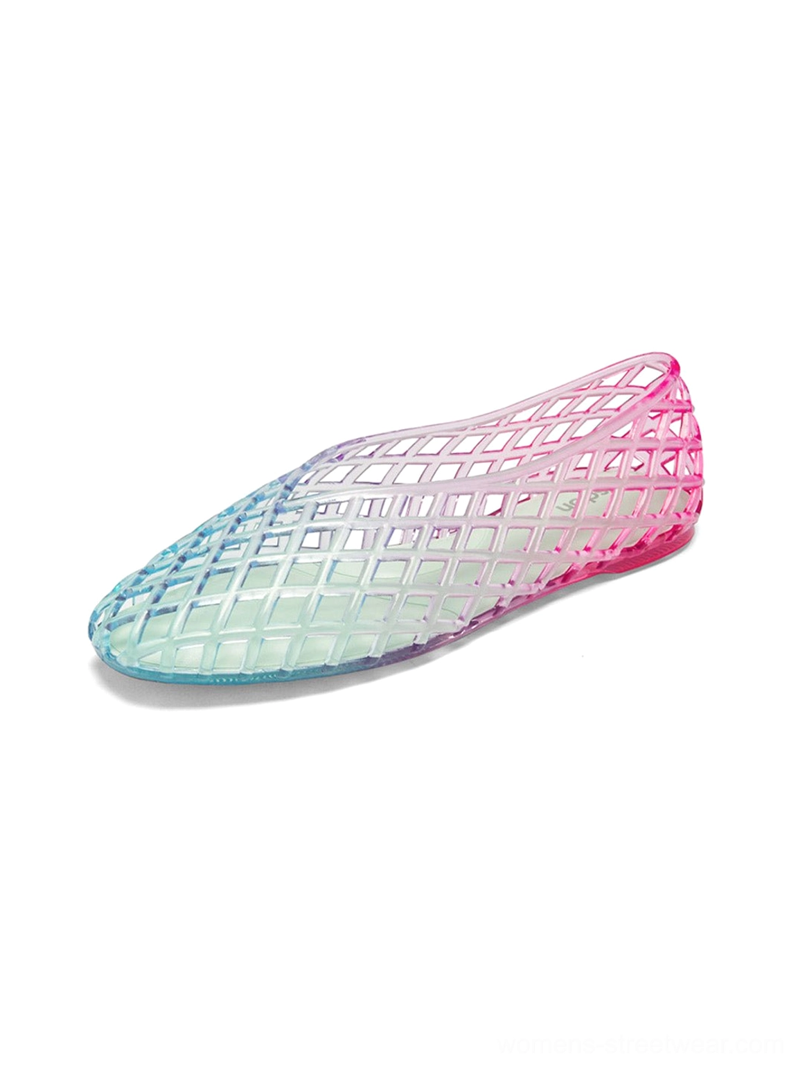 Side flat lay view of translucent gradient jelly ballet flat with open lattice pattern and colorful ombre finish