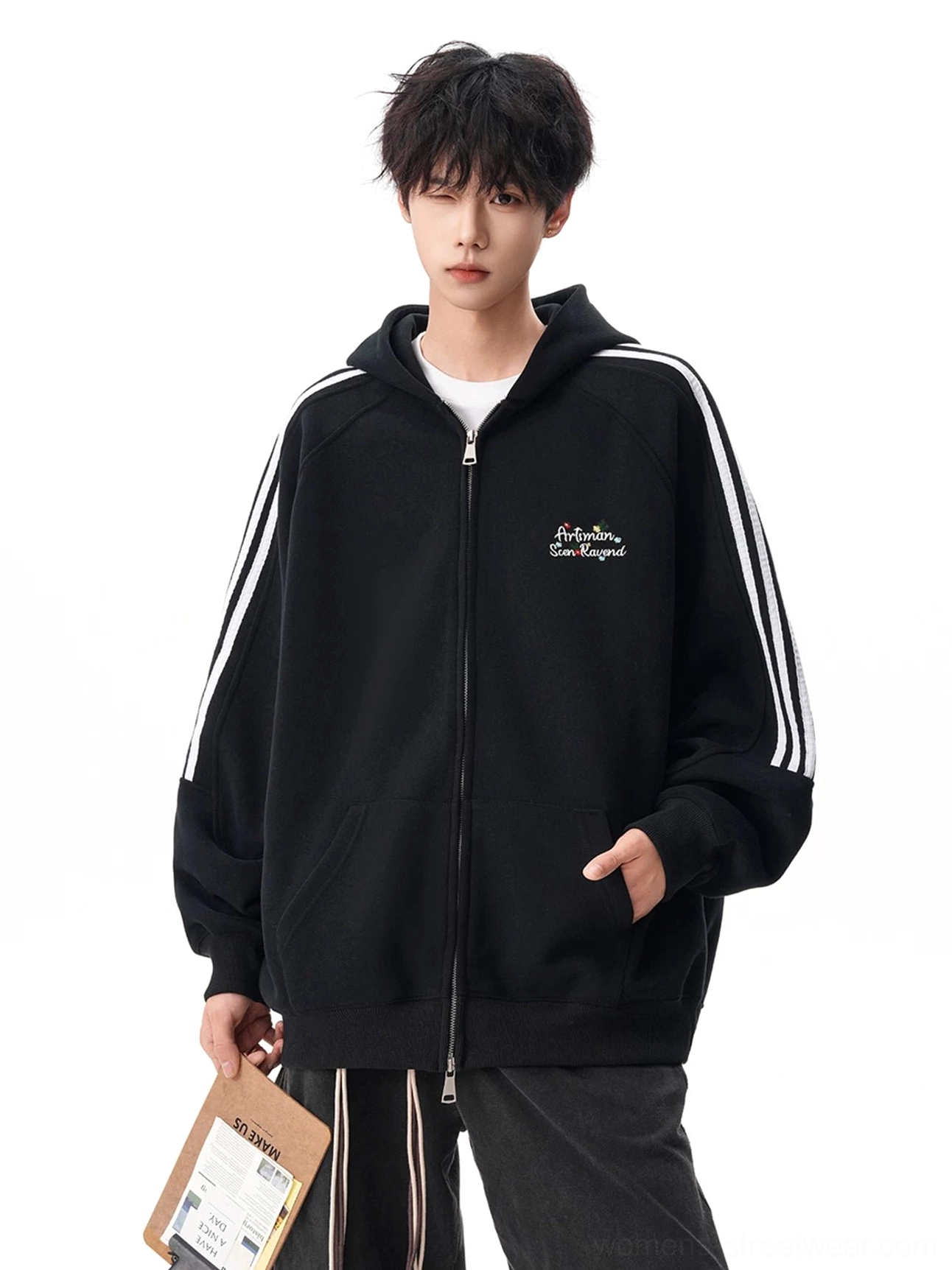 Black triple stripe zip hoodie with embroidered chest detail, oversized Korean streetwear fit, hood, and front kangaroo pocket shown from the front