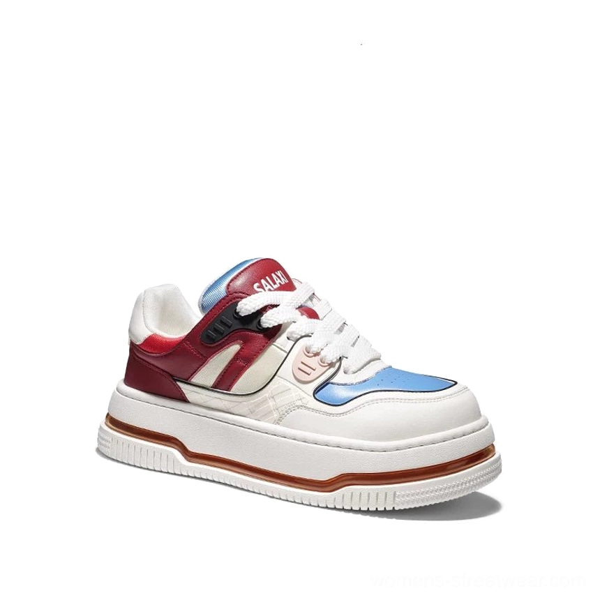 Two-tone chunky platform casual sneaker with blue toe cap red heel panel and thick off-white rubber sole