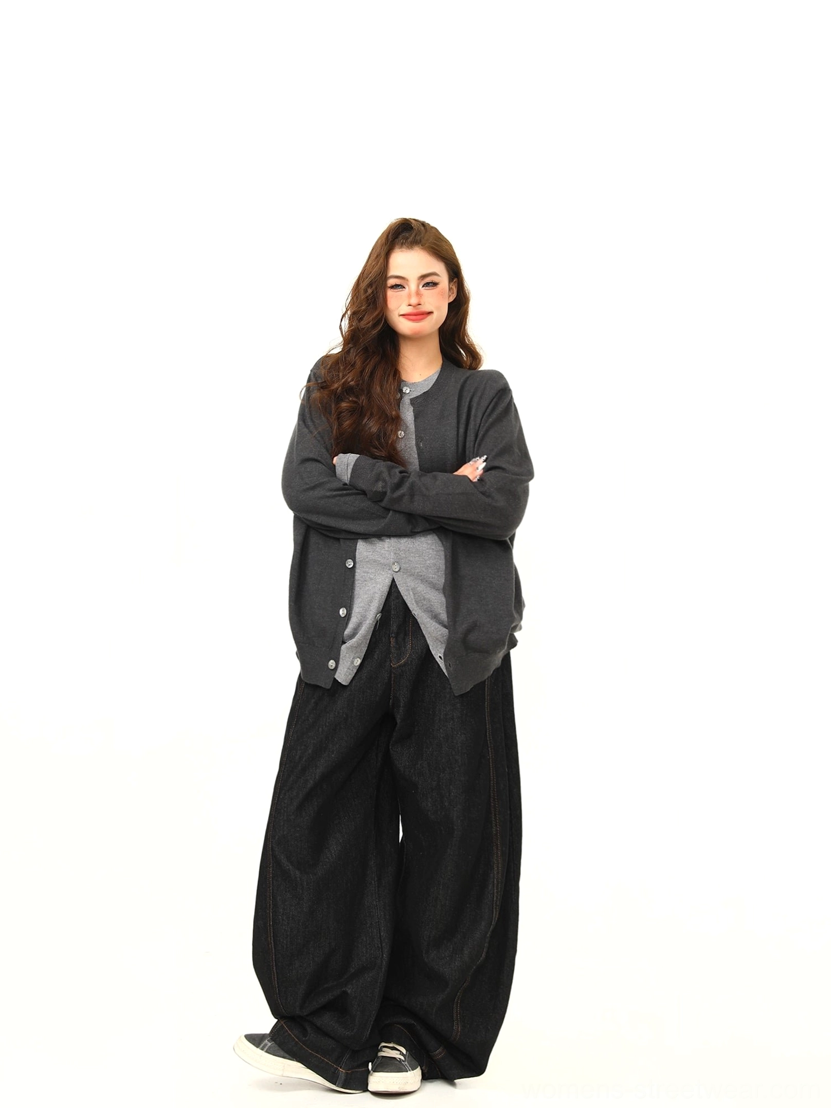 Women’s dark and light gray faux layered button cardigan styled with wide-leg black jeans in a relaxed Seoul streetwear outfit