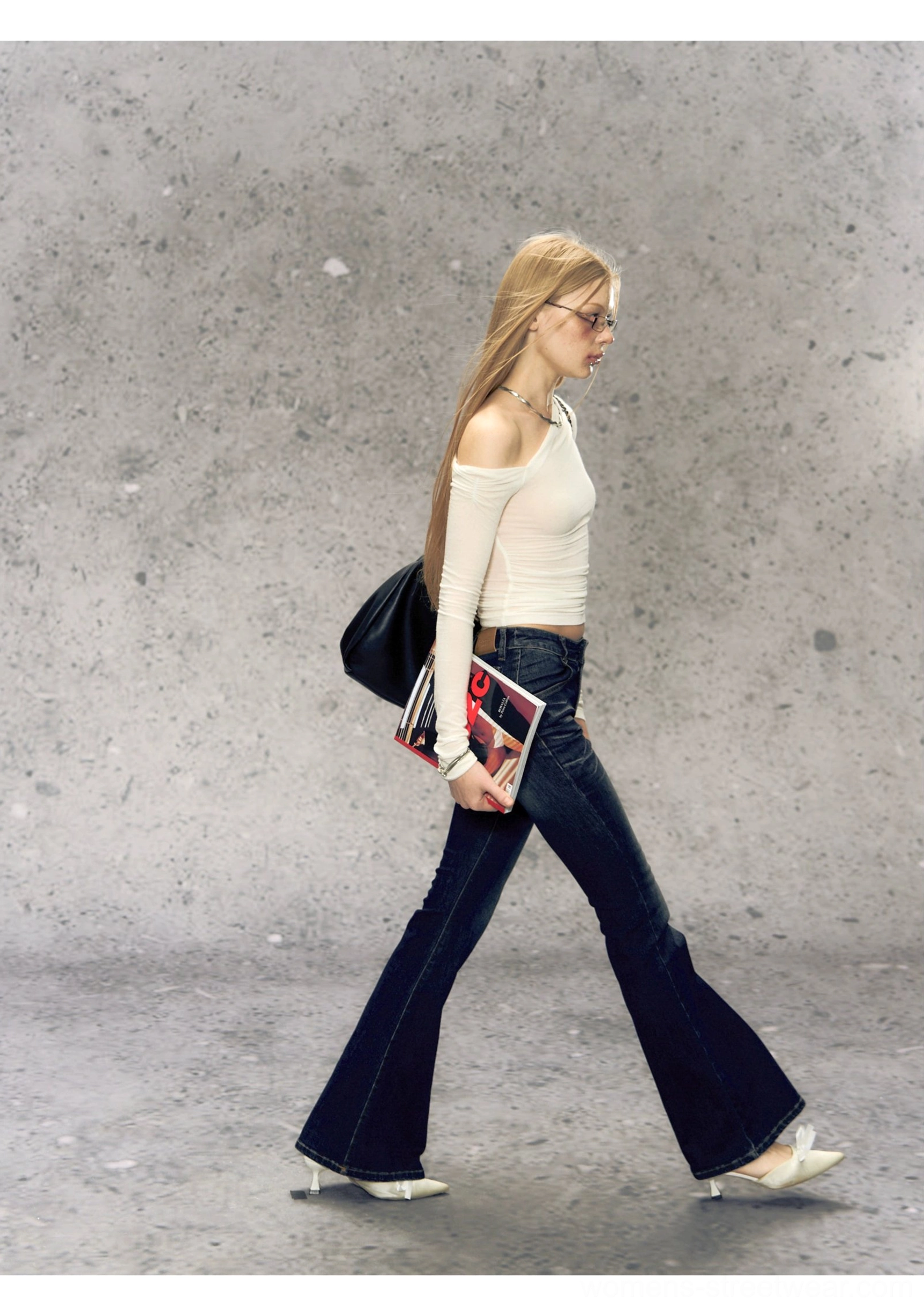 Women’s two-tone micro flare jeans product image featuring high-rise shaping and a subtle leg-lengthening flare