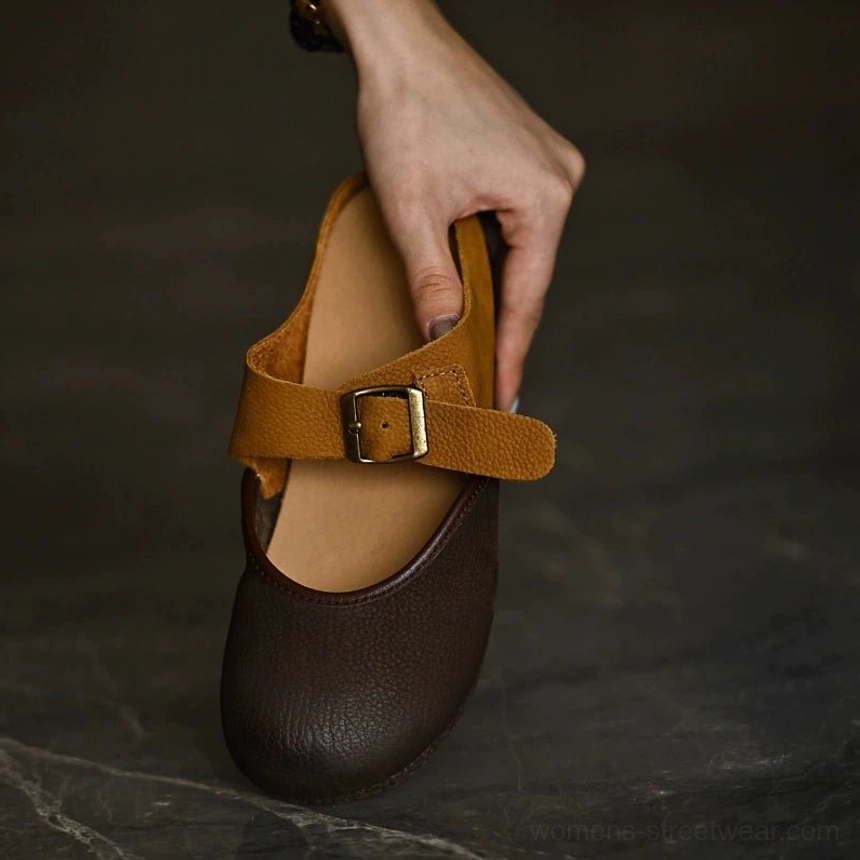Vintage-inspired two-tone leather Mary Jane flats in brown and tan color block design