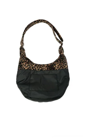 Two-tone leopard print hobo shoulder bag with black nylon body front pocket and adjustable animal print strap