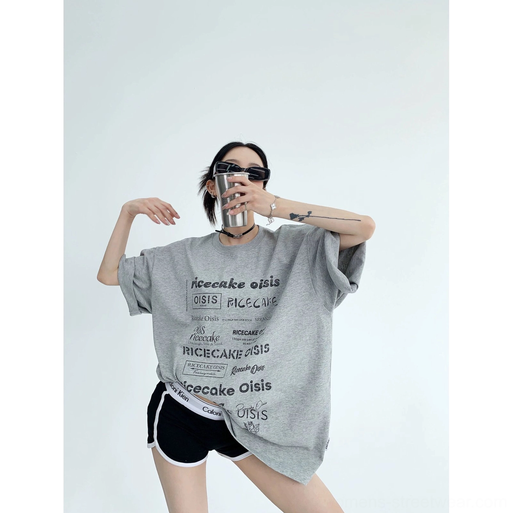 Gray typographic riot oversized streetwear t-shirt with white all-over graphic lettering print