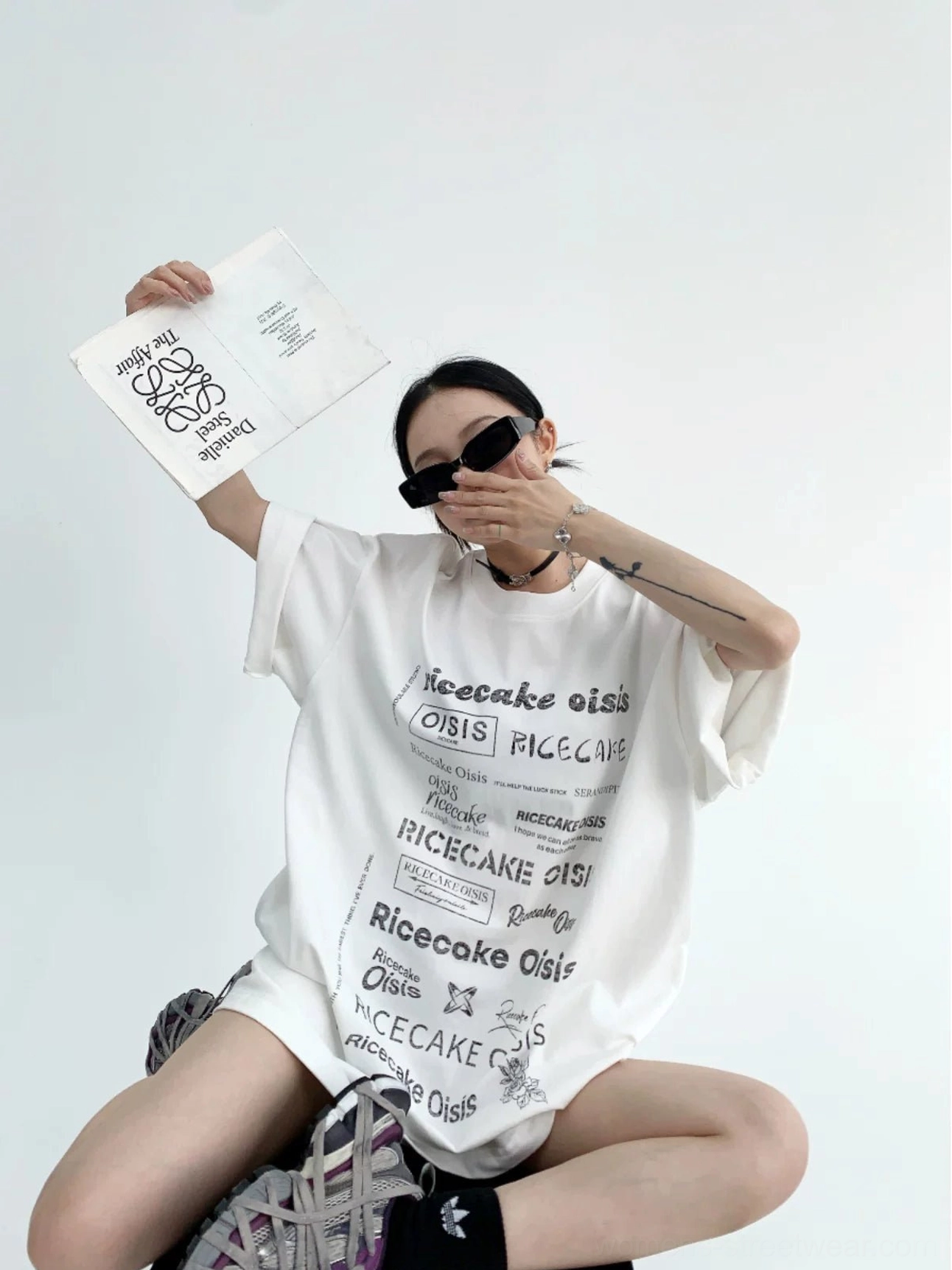 White typographic riot oversized graphic t-shirt with black all-over lettering and relaxed crewneck fit