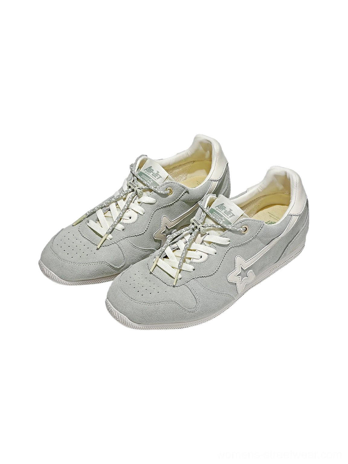 Unisex low-top retro trainers designed with soft suede panels, textile sections, lace-up fastening, and a vintage streetwear silhouette
