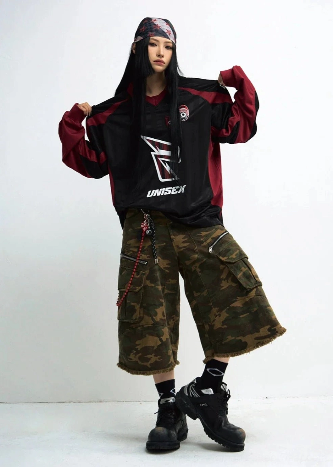 Relaxed fit unisex racing team graphic sweatshirt in black and wine red styled as Korean streetwear on female model