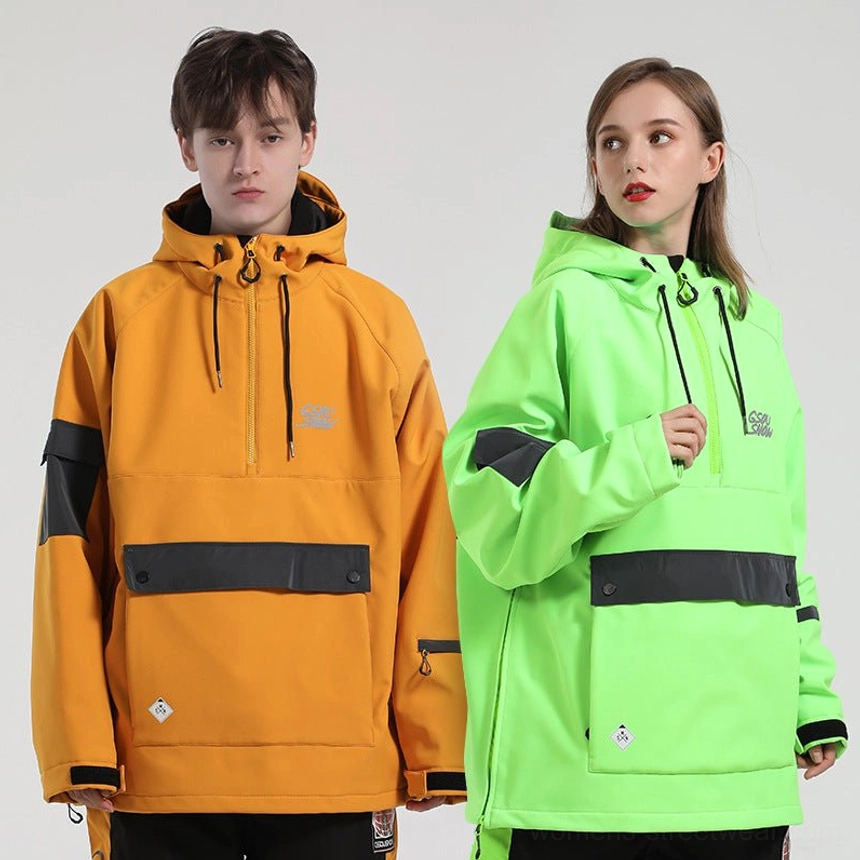 Unisex reflective half-zip ski anorak jacket worn by male and female models in contrasting outdoor streetwear colorways