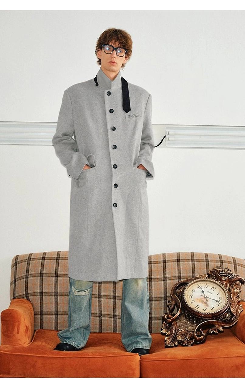 Unisex velvet trim stand collar wool blend long overcoat contemporary streetwear fashion detail view