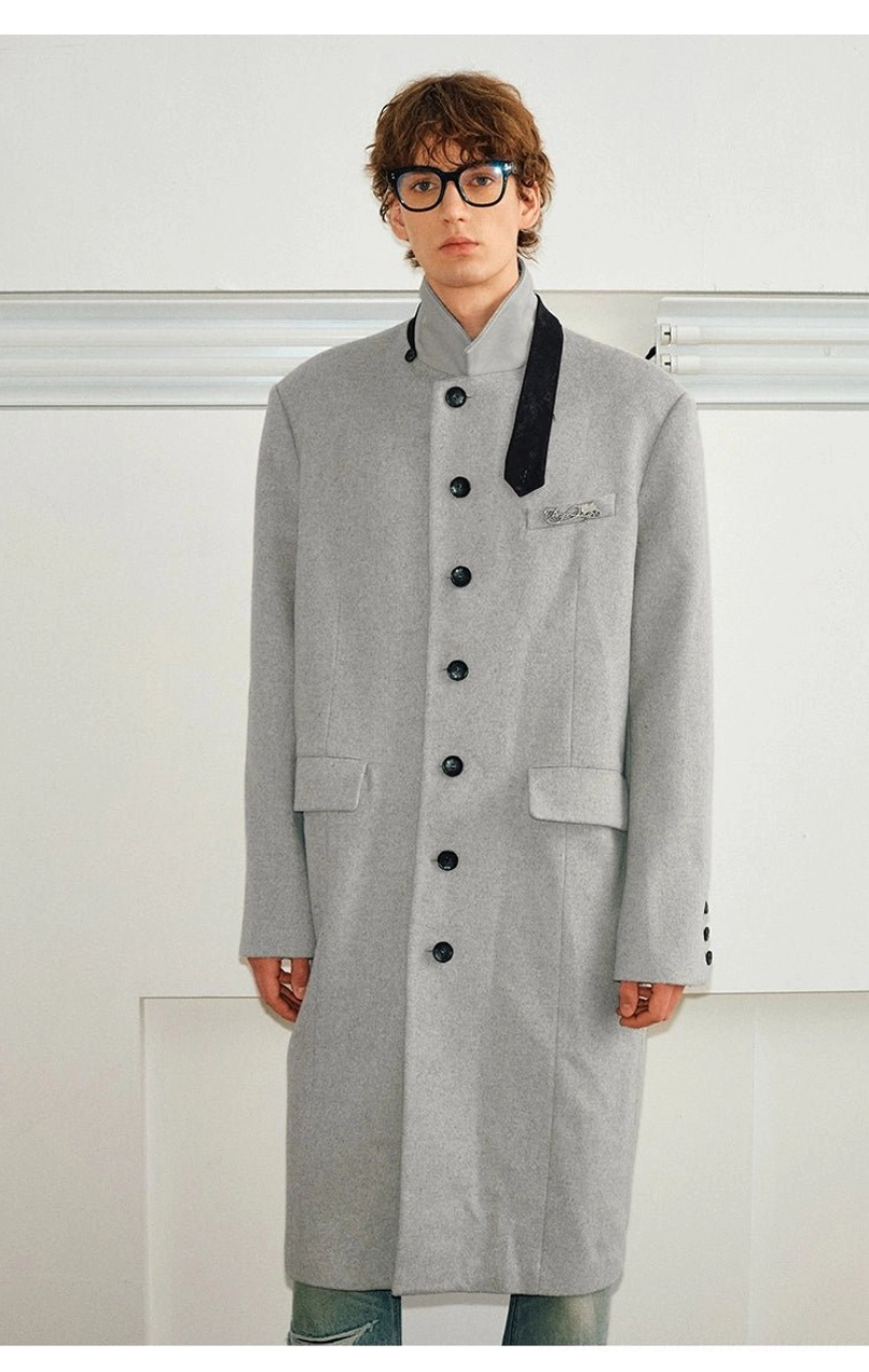 Unisex velvet trim stand collar wool blend long overcoat wool texture and tailored silhouette detail
