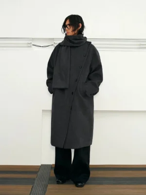 Gray-blue unisex wool blend cape collar long overcoat worn with black wide-leg trousers