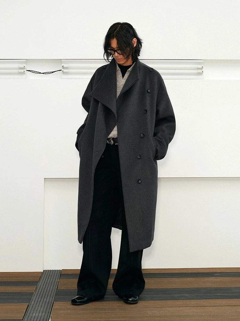 Gray-blue wool blend long overcoat side view showing oversized collar and double-breasted silhouette