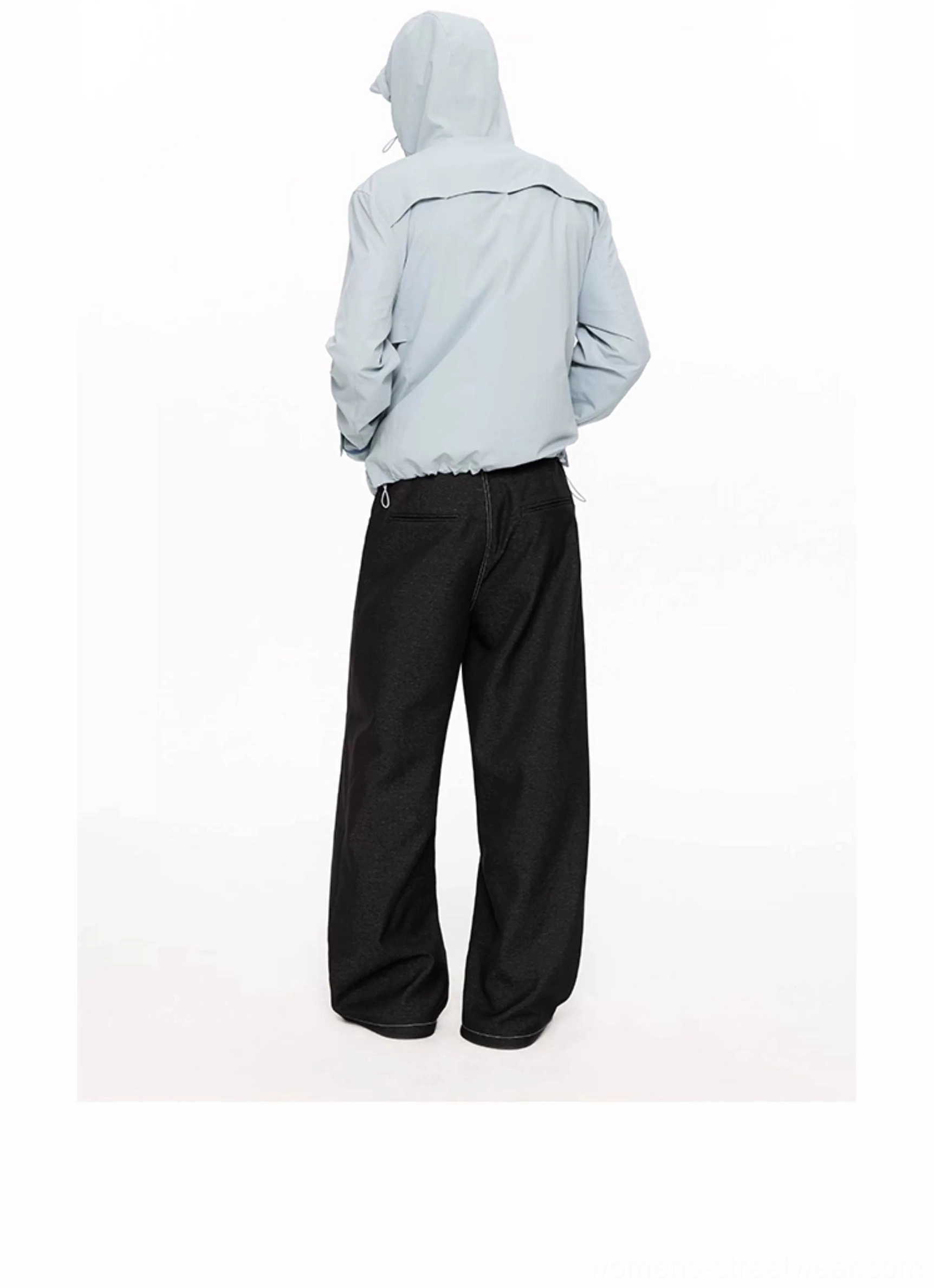 Lightweight hooded UV protection jacket showing adjustable hem drawcord and technical outerwear details