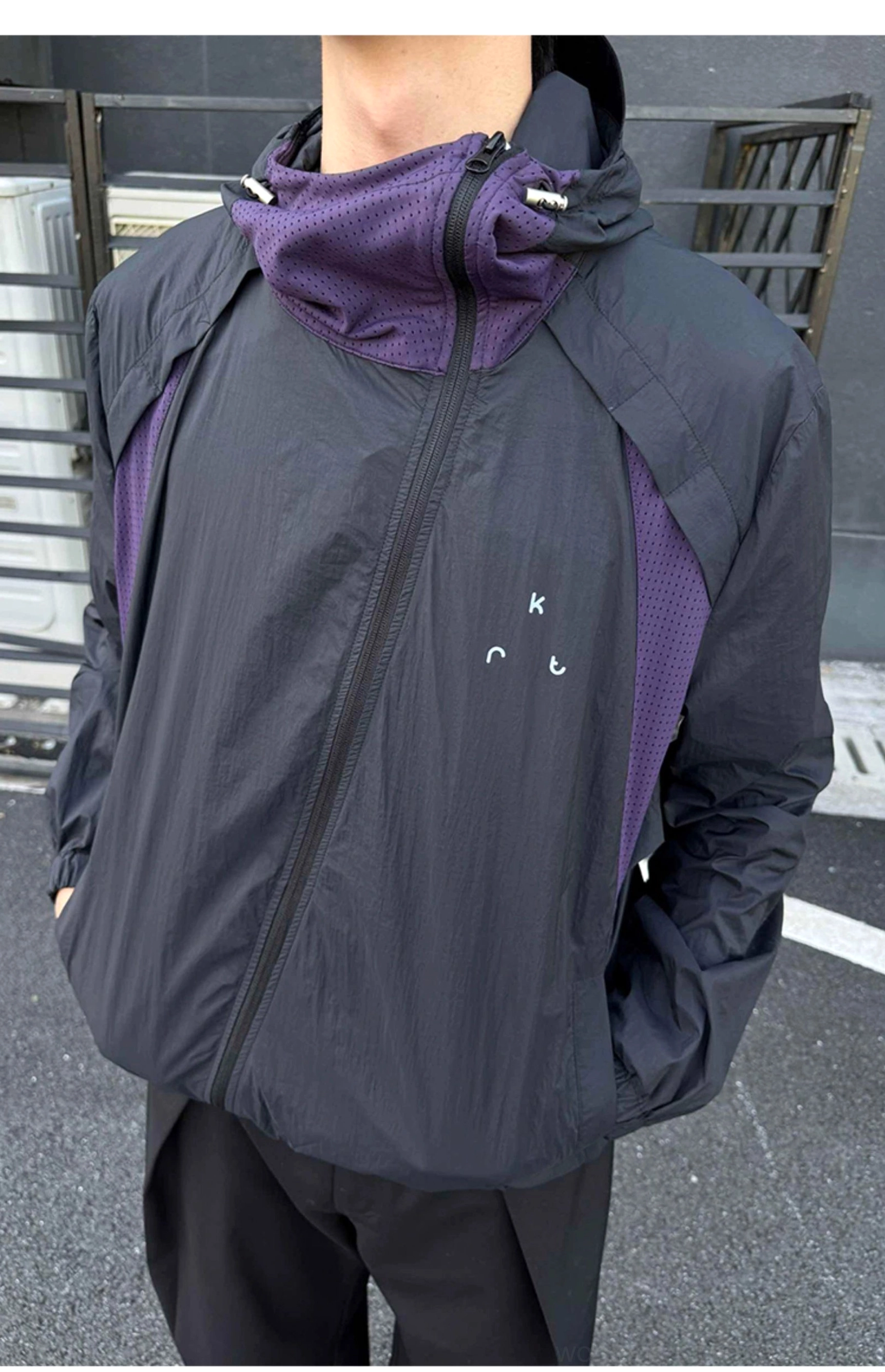 UPF 50 lightweight hooded techwear jacket showing breathable technical fabric and sun protective design