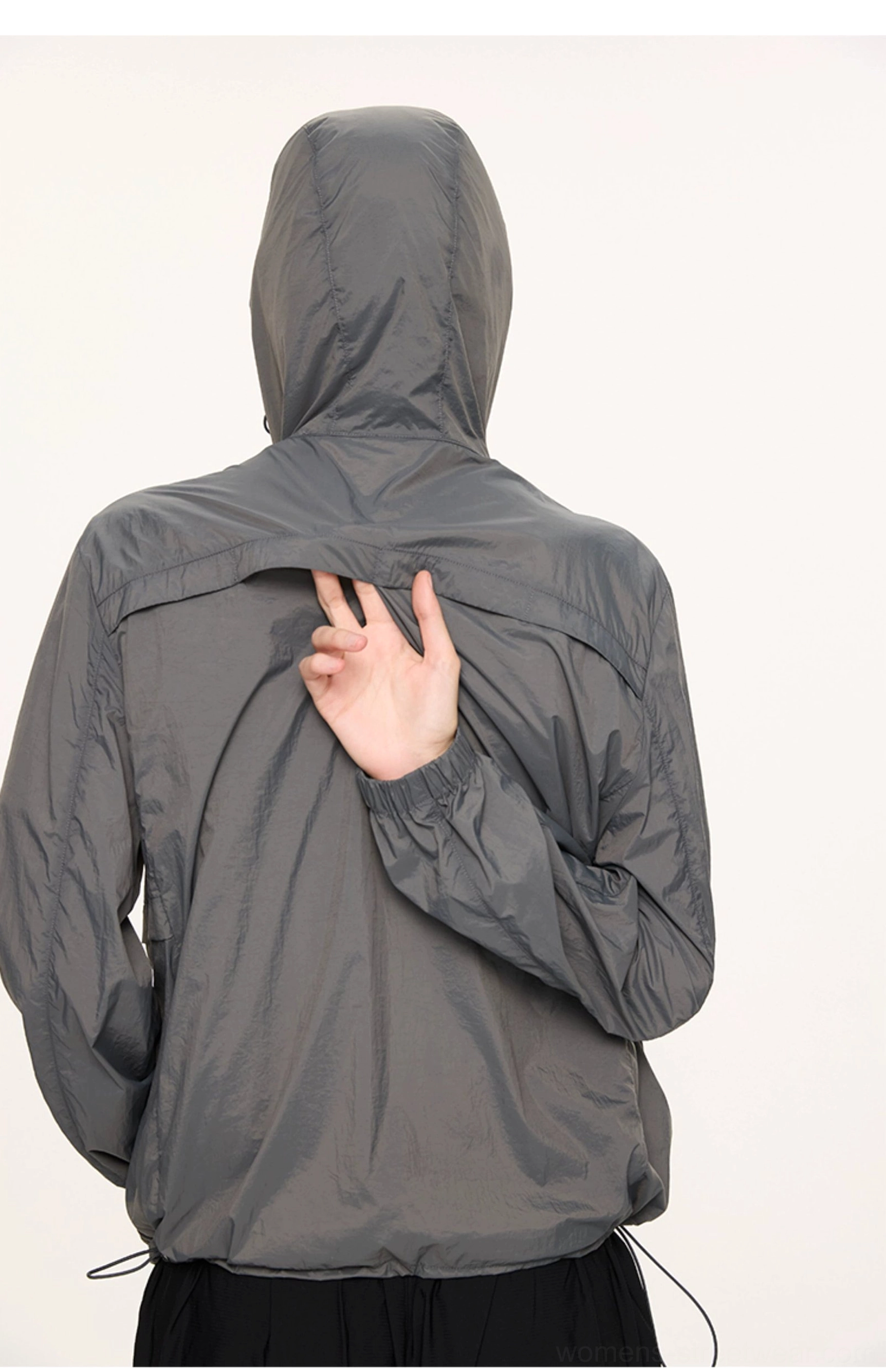 Dark gray lightweight UV protection hooded jacket shown from the back with adjustable hem streetwear fit