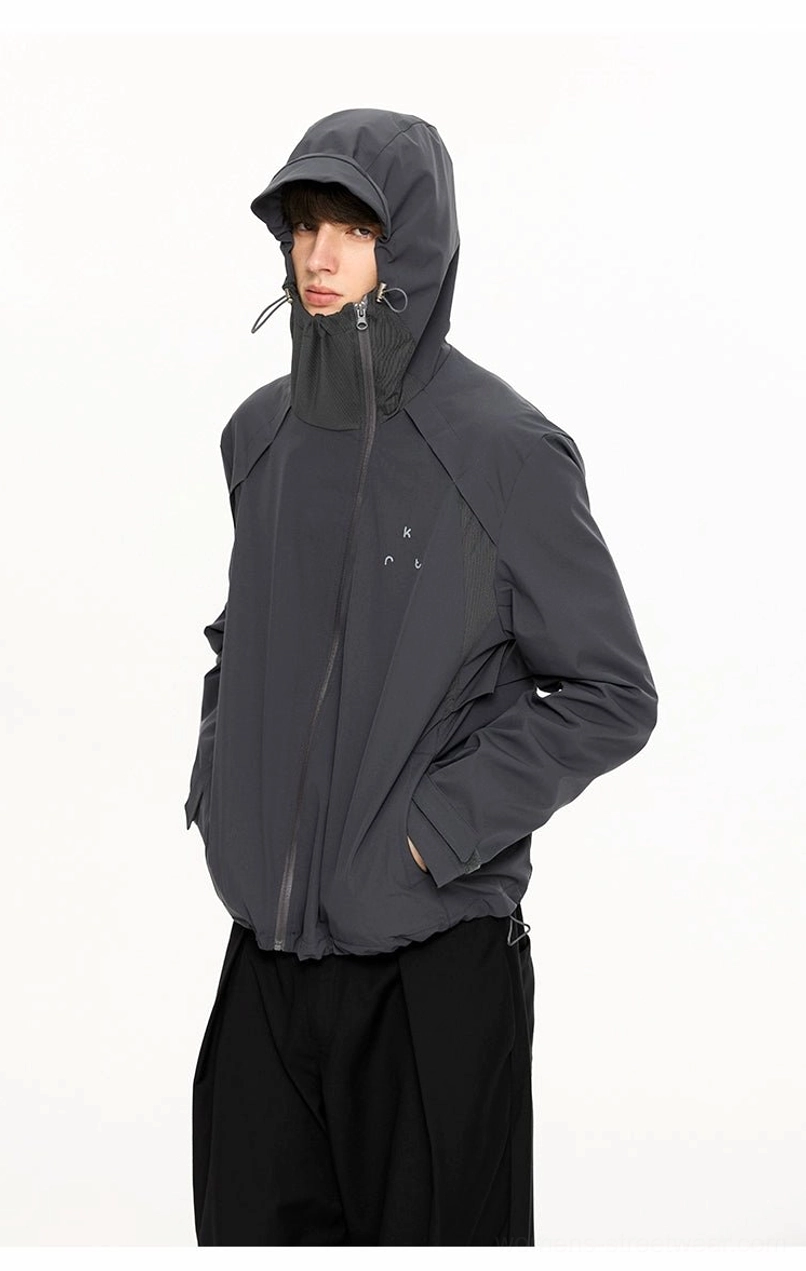 UPF 50 lightweight hooded jacket product detail showing functional zipper and clean urban outdoor styling