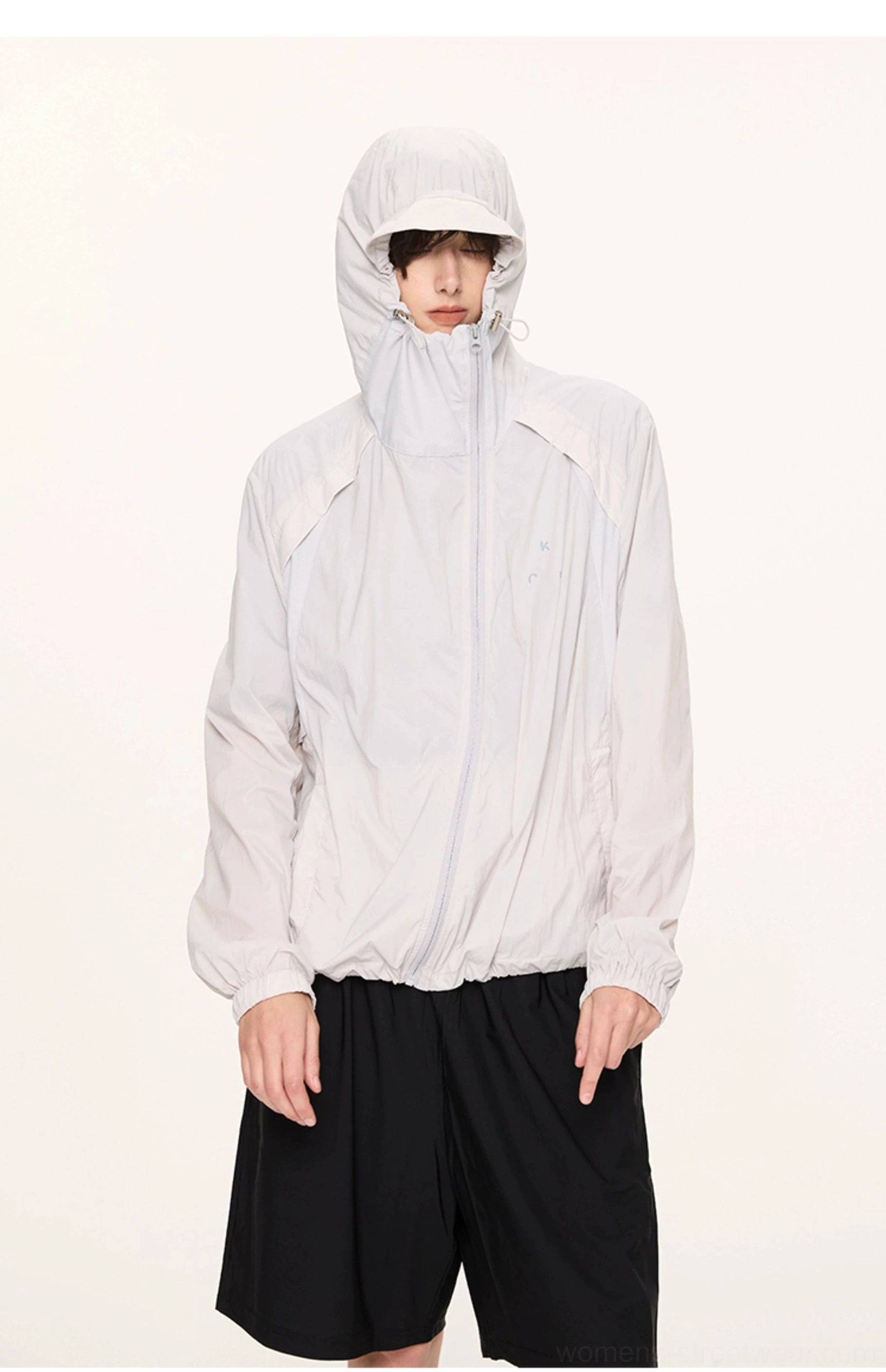 Light gray UPF 50 hooded sun protection techwear jacket with extended brim hood and relaxed fit