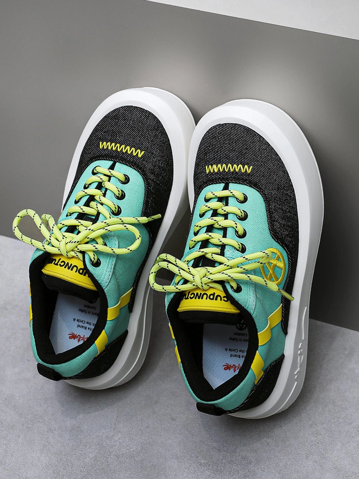 Urban colorblock canvas platform footwear with vibrant styling suitable for concerts city walks and casual outfits