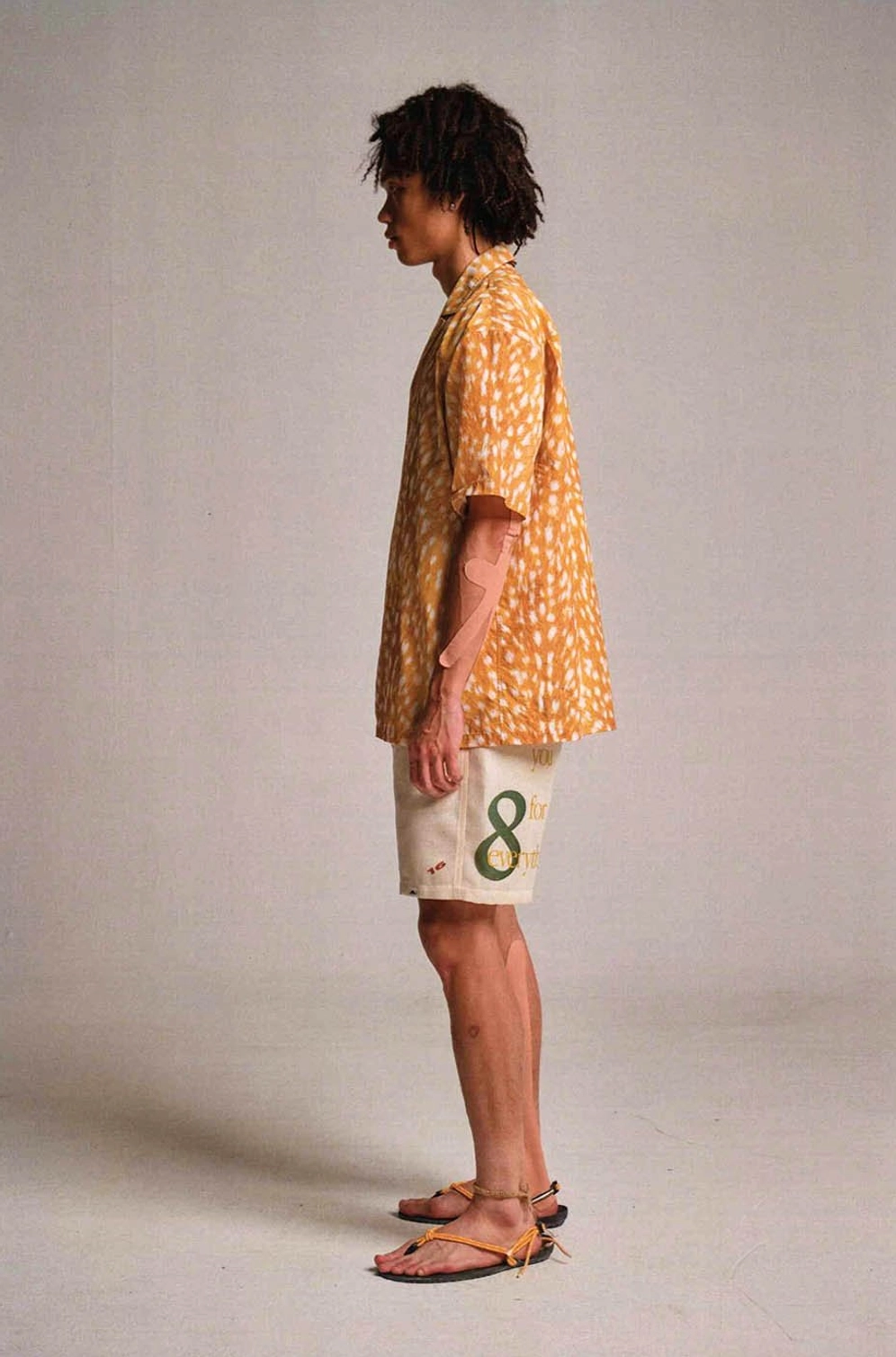Apricot Urban Forest graphic sweat shorts styled with retro floral shirt for summer streetwear outfit