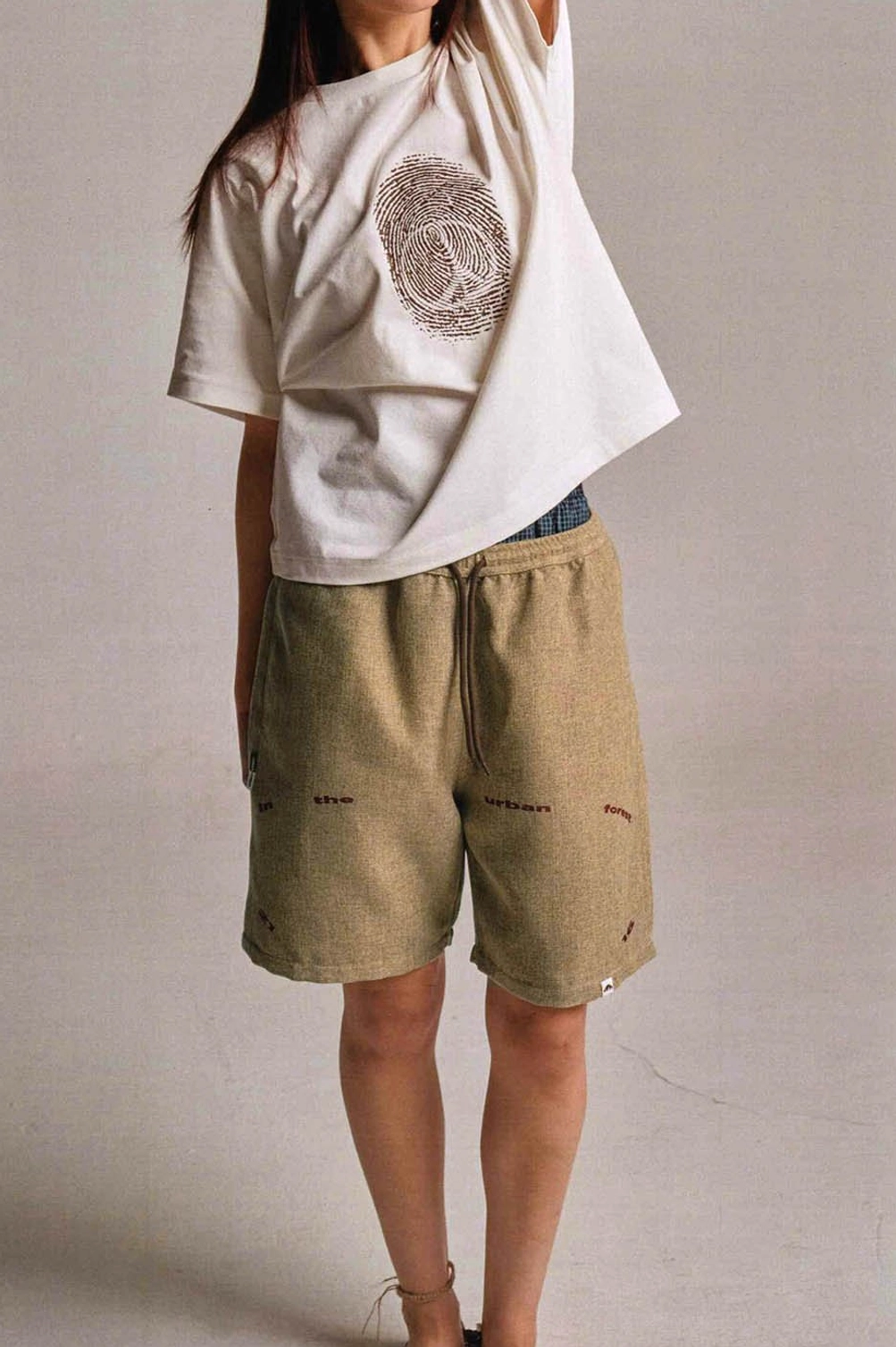 Urban Forest graphic sweat shorts detailed product view with loose casual streetwear silhouette
