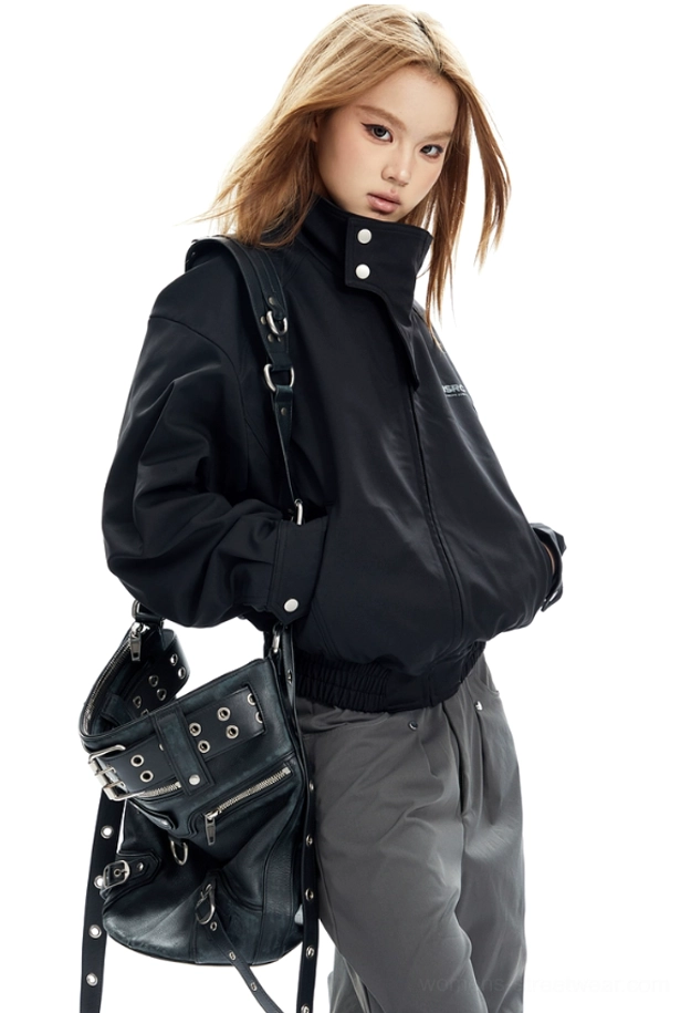 Modern utility-inspired cropped bomber jacket with stand collar, zip front, ribbed cuffs, and versatile streetwear proportions