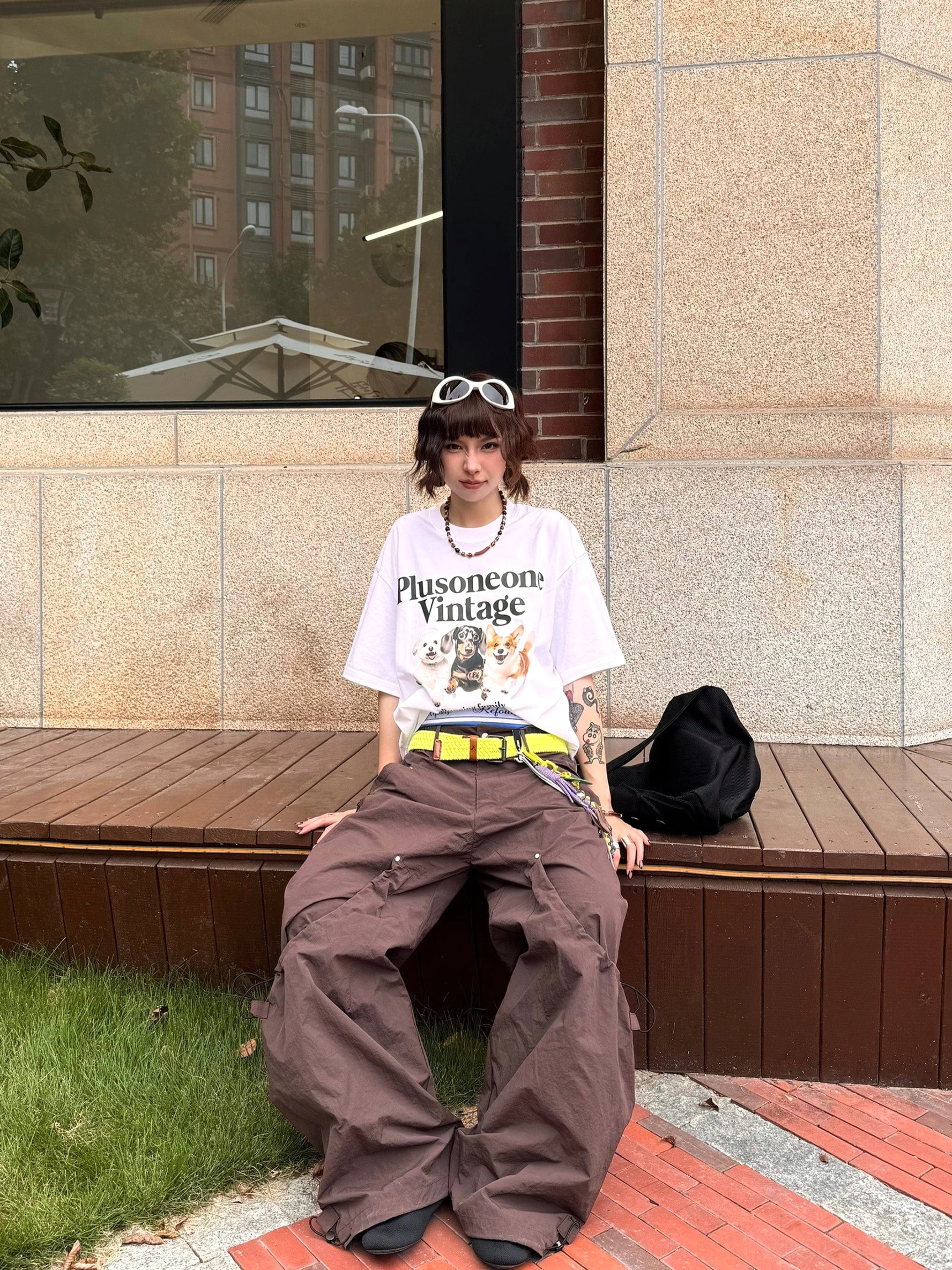 Utility inspired wide leg cargo pants with adjustable hems and oversized pockets for contemporary city outfits