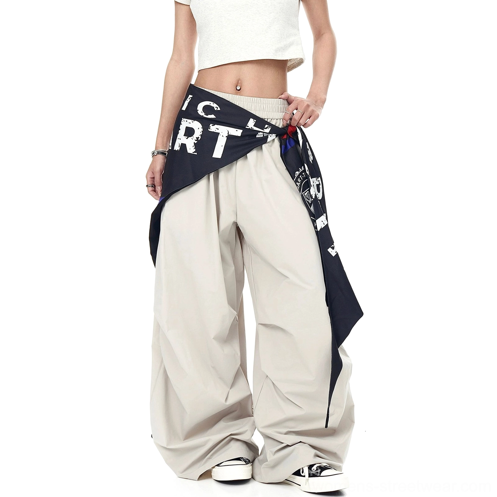 Wide-leg varsity streetwear cargo pants with parachute drape, relaxed oversized construction, and detachable printed scarf accessory