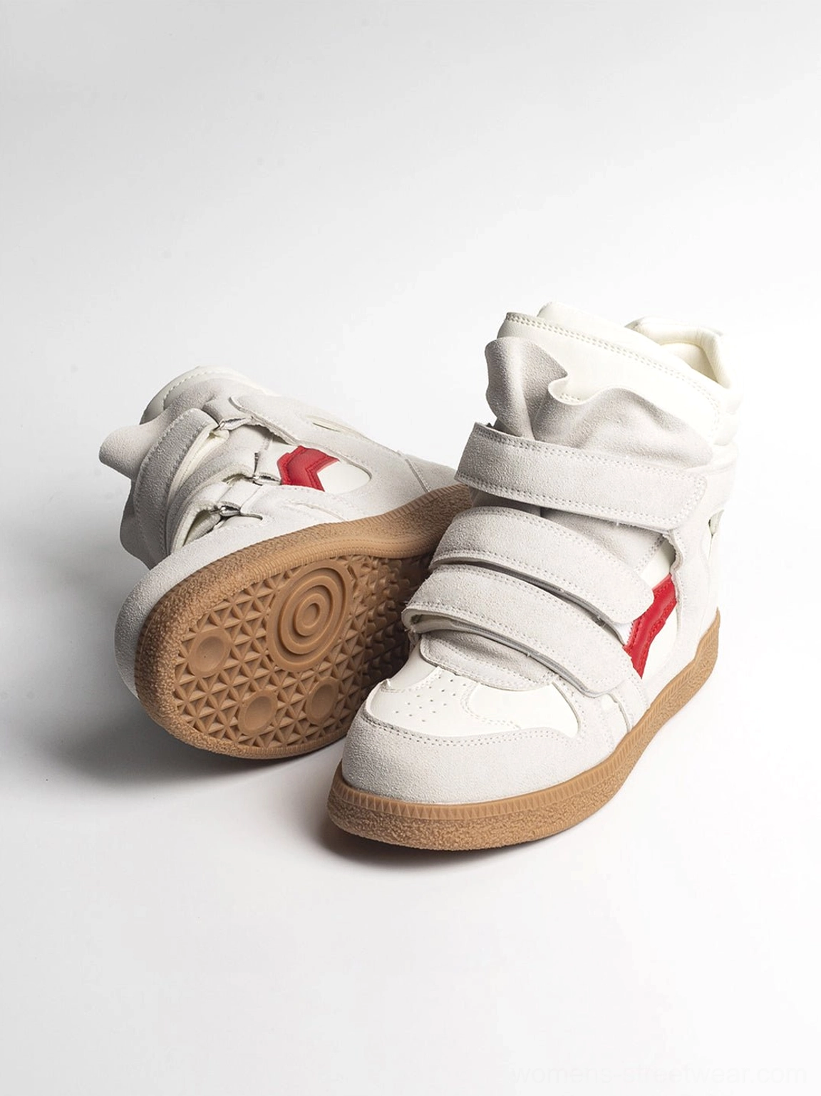 Multi-strap Velcro hidden-wedge high-top sneakers showing the textured gum rubber tread and light gray upper with red accent stripe