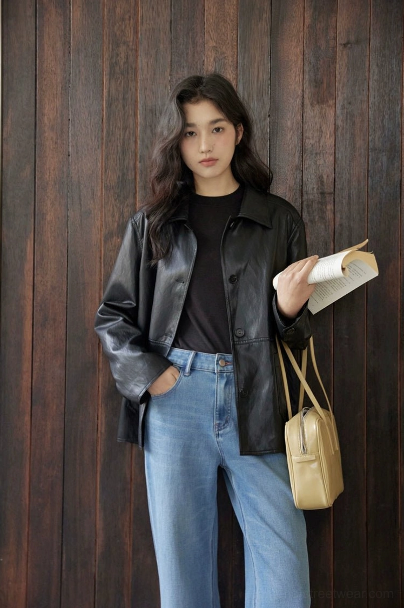 Versatile women’s leather-look outerwear jacket with neat collar and short contemporary silhouette