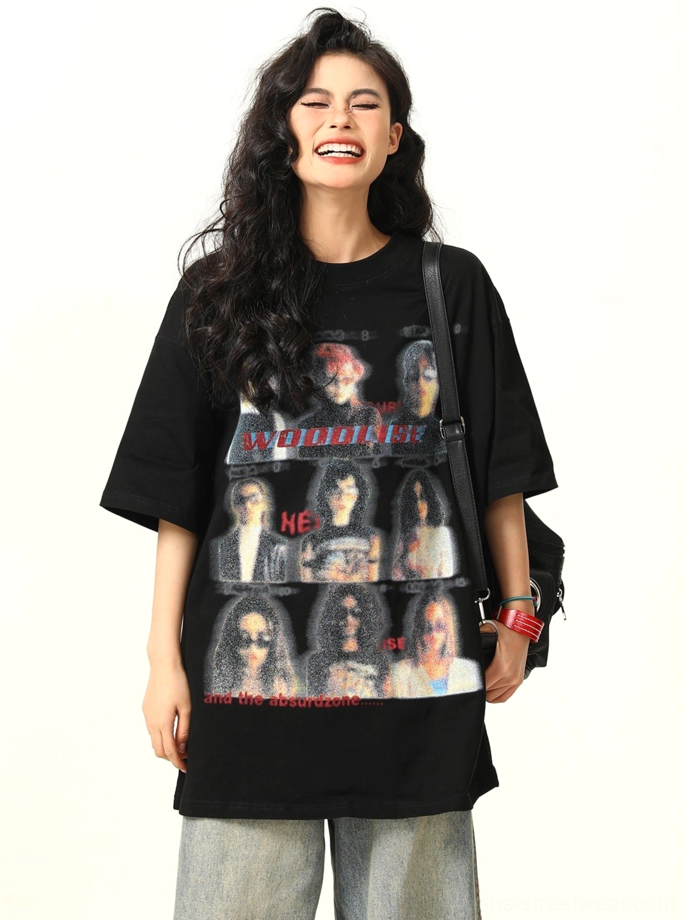 Black vintage band graphic oversized streetwear t-shirt front view styled with wide leg jeans