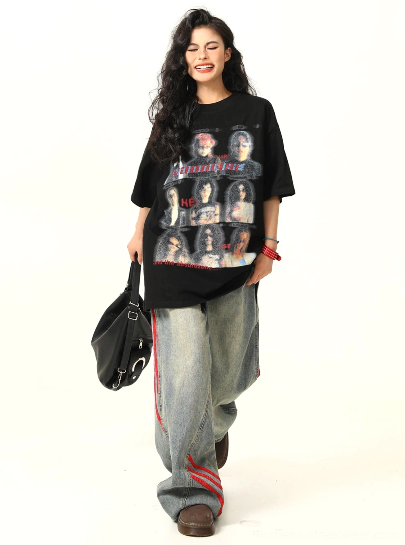 Black oversized vintage band graphic streetwear t-shirt walking side profile with wide leg jeans