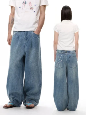 Vintage blue balloon wide leg boyfriend streetwear jeans shown front and back on models in a white studio