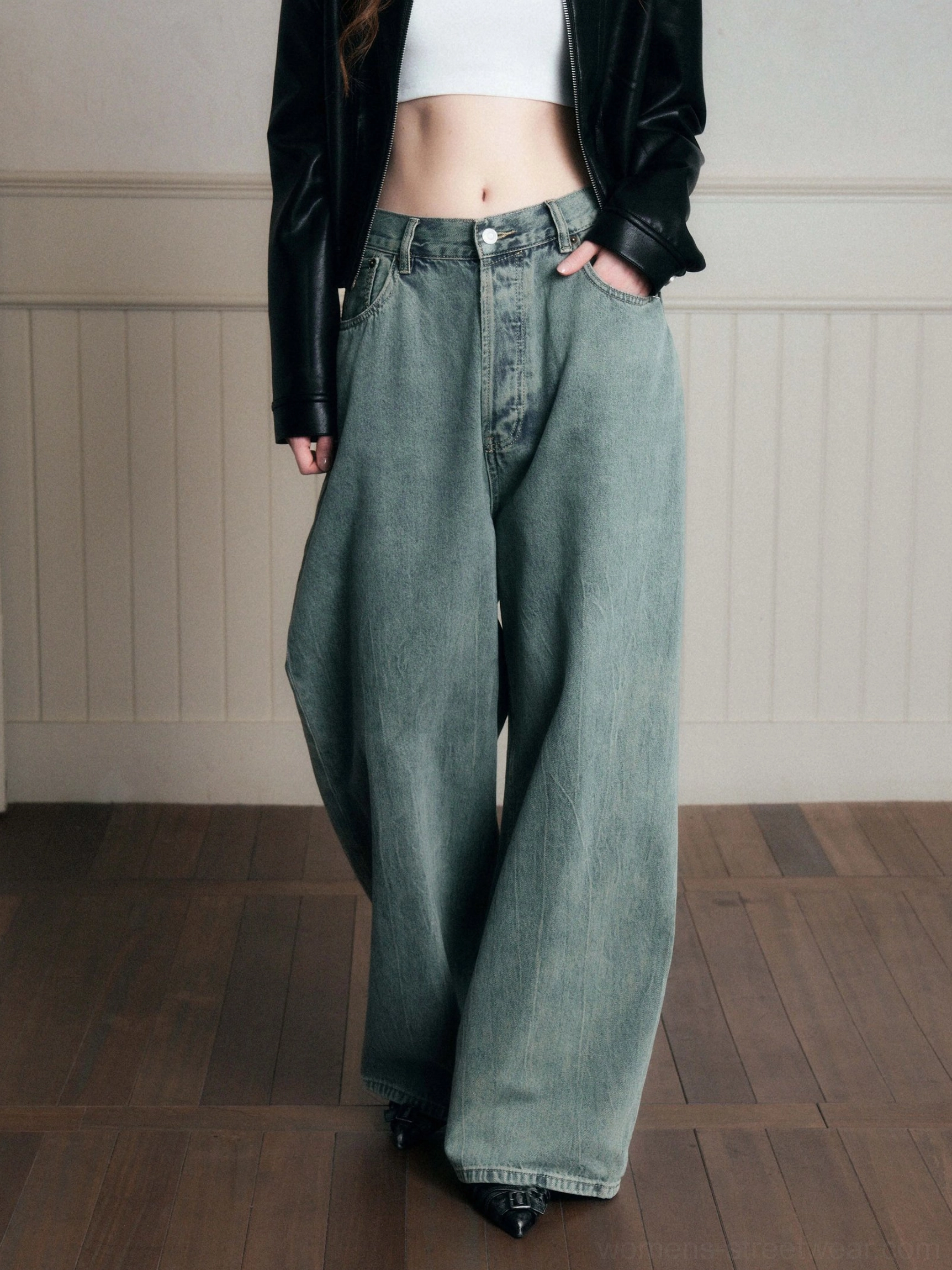 Vintage distressed blue wide-leg jeans product image showing the relaxed full-length silhouette and soft faded denim finish