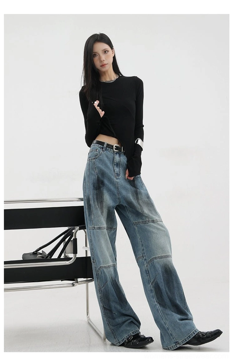 Vintage distressed wide-leg jeans rear view on dress form illustrating back pocket placement construction details and overall silhouette from behind perspective