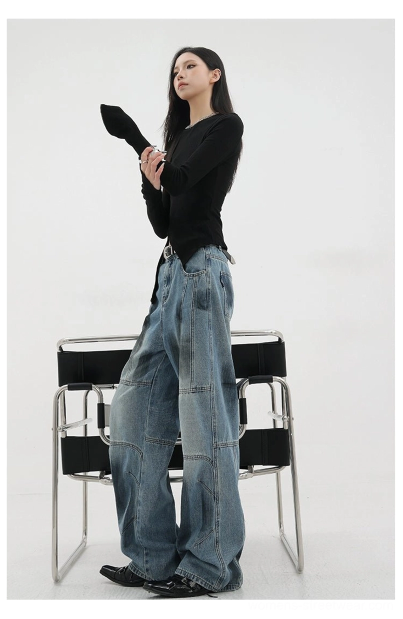 Vintage distressed wide-leg jeans side view on dress form showcasing wide leg proportion relaxed fit and side seam panel construction from neutral fashion perspective
