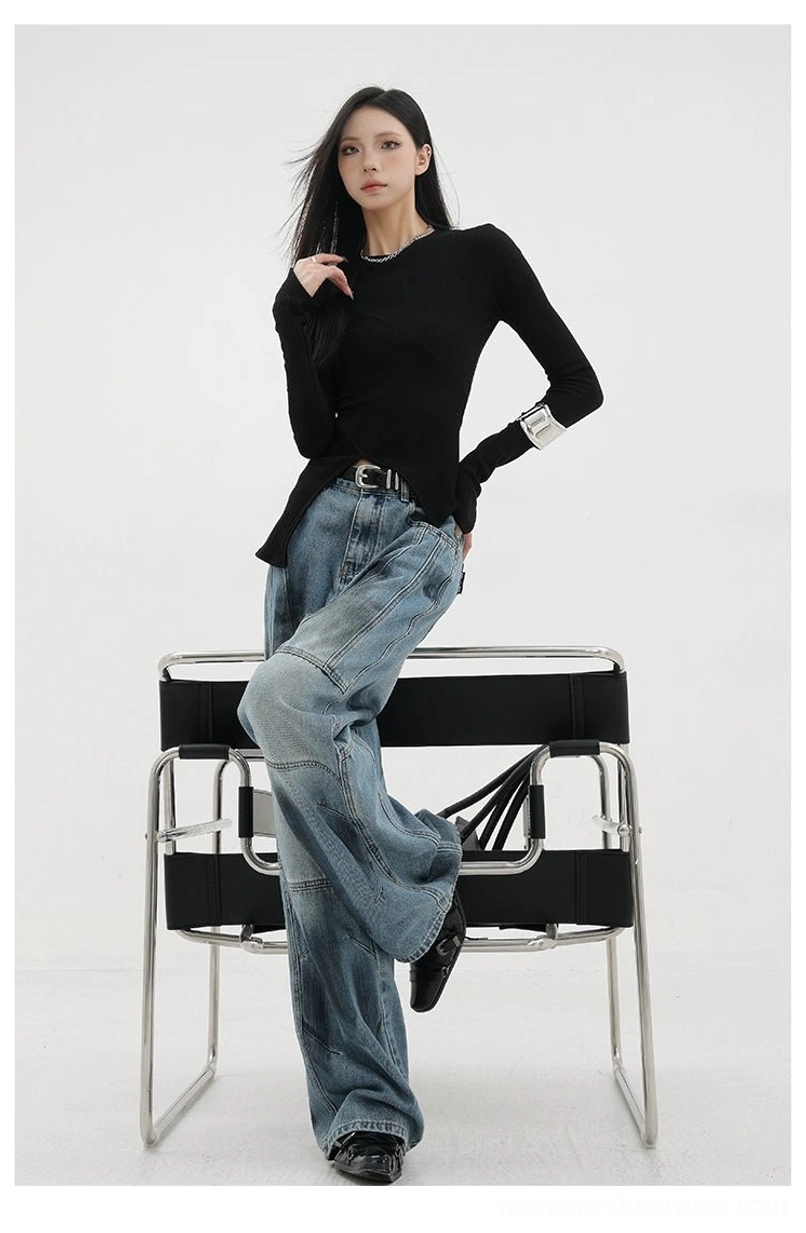Vintage distressed wide-leg jeans three-quarter front view on dress form displaying full silhouette proportion and multi-panel seaming without model interference