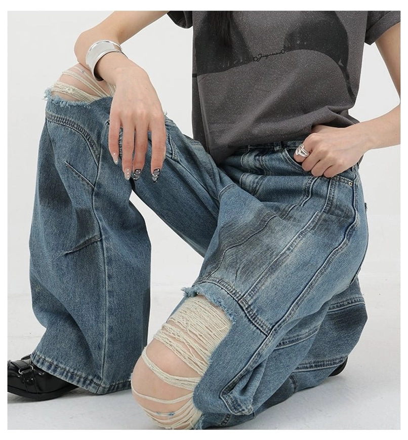 Vintage distressed wide-leg jeans styled with alternative footwear showing how wide leg silhouette complements sneakers boots and platform shoes for grunge aesthetic
