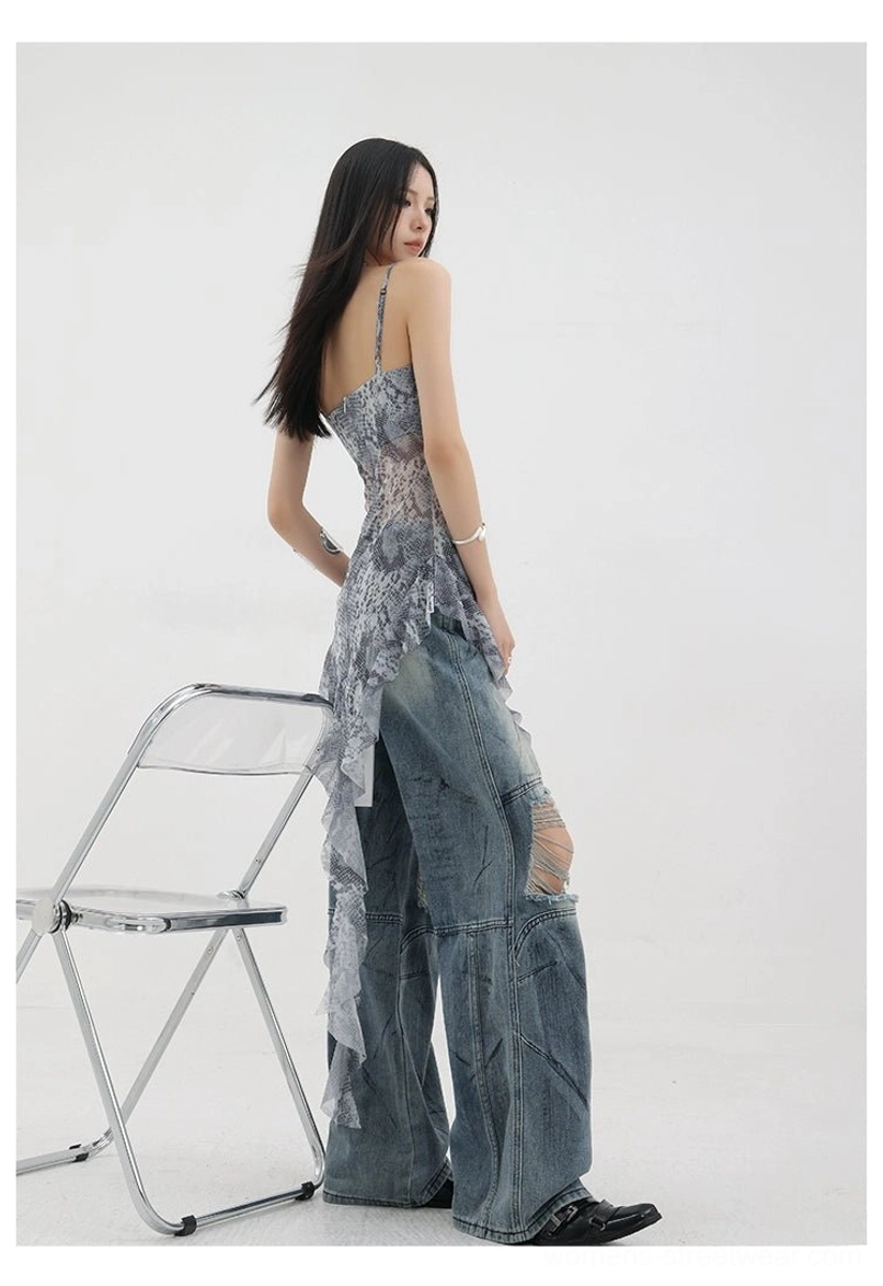 Vintage distressed wide-leg jeans material composition and fabric quality close-up showing denim blend durability and authenticity of construction