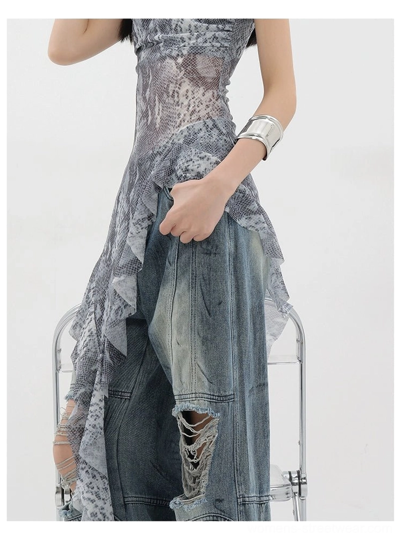 Vintage distressed wide-leg jeans movement and drape demonstration showing how silhouette flows and stacks with walking and dynamic positioning