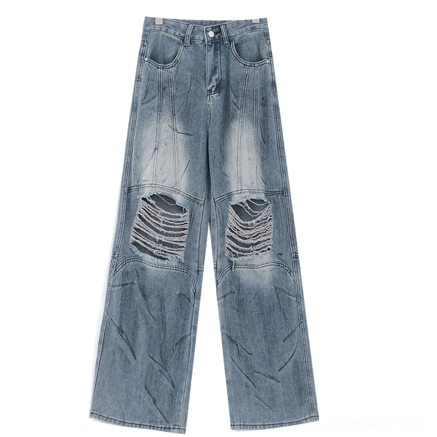 Vintage distressed wide-leg jeans blue non-painted style detailed view displaying classic denim blue authentic finish without extensive fading complete visual