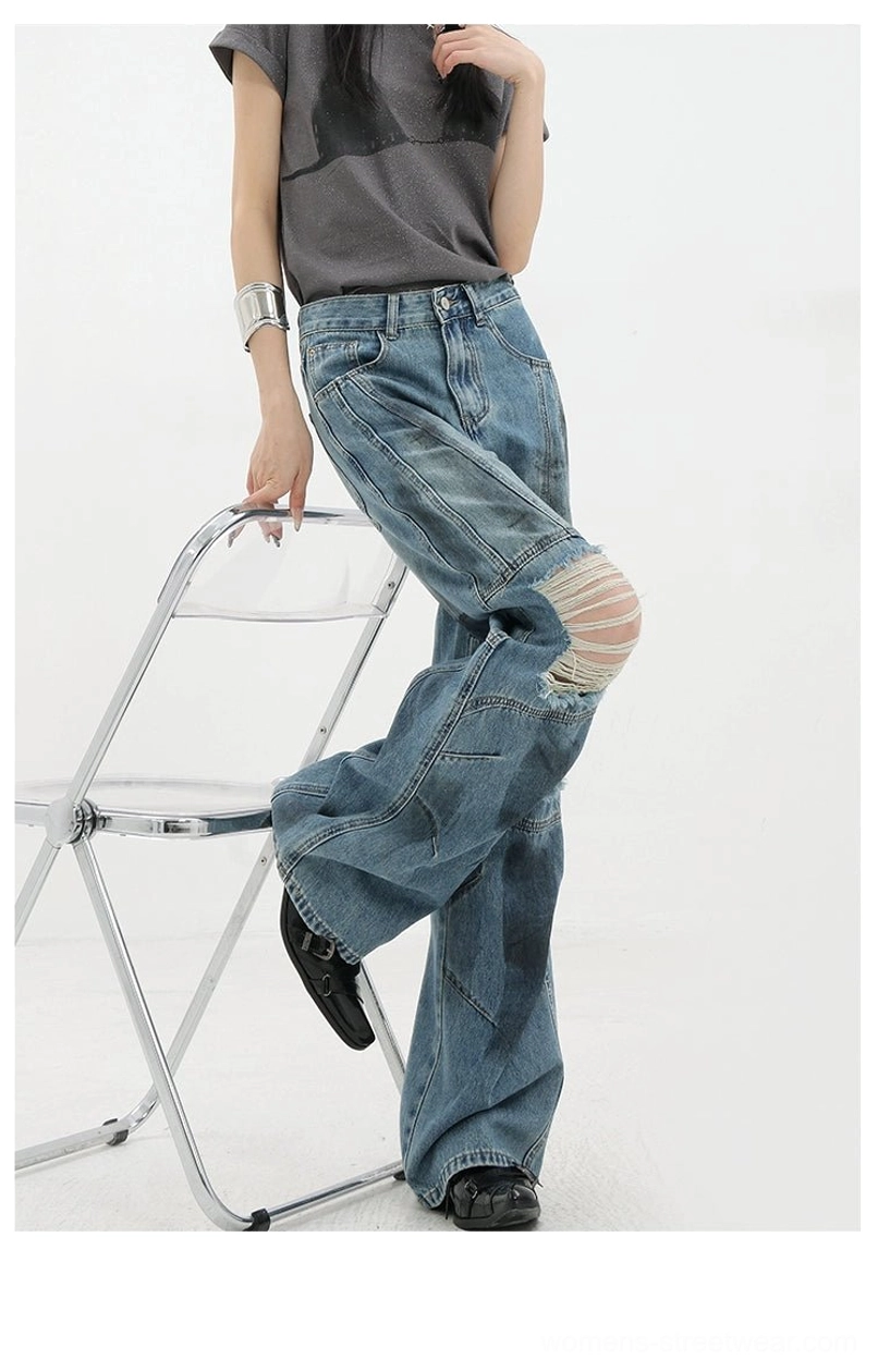 Vintage distressed wide-leg jeans leg panels side seam detail illustrating multi-panel construction architectural seaming and loose silhouette engineering for maximum visual impact