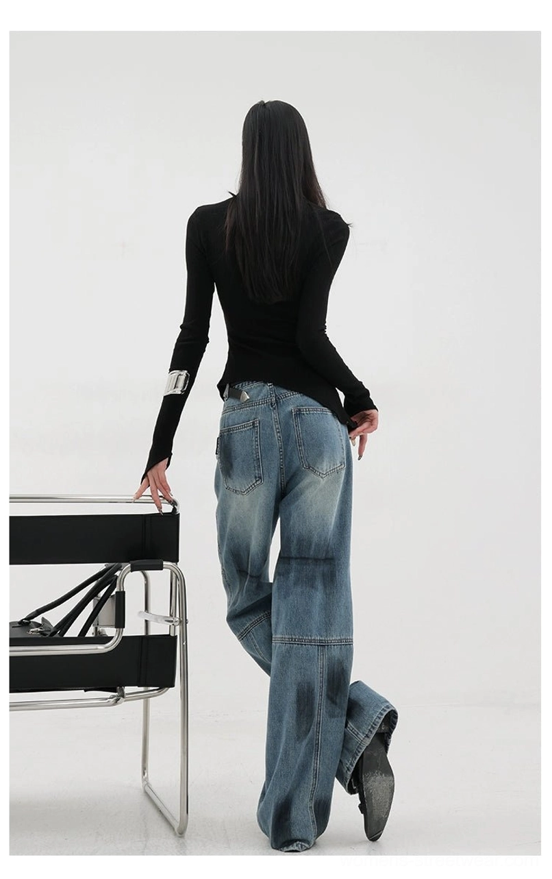 Vintage distressed wide-leg jeans size XS on petite model demonstrating proper fit and silhouette for extra small sizing in streetwear styling context