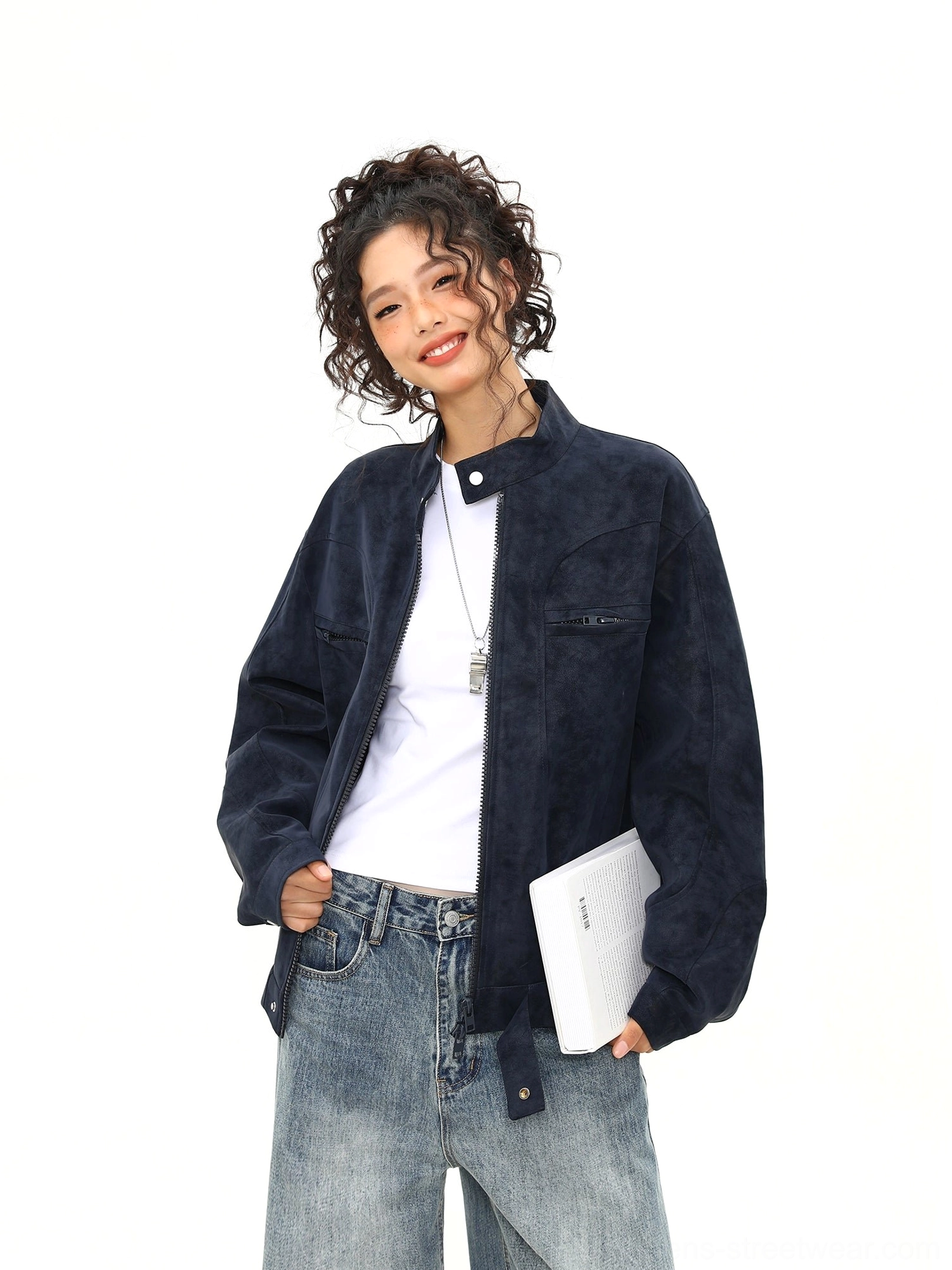 Dark blue vintage faux suede zip jacket with utility chest pockets and relaxed oversized silhouette three quarter view