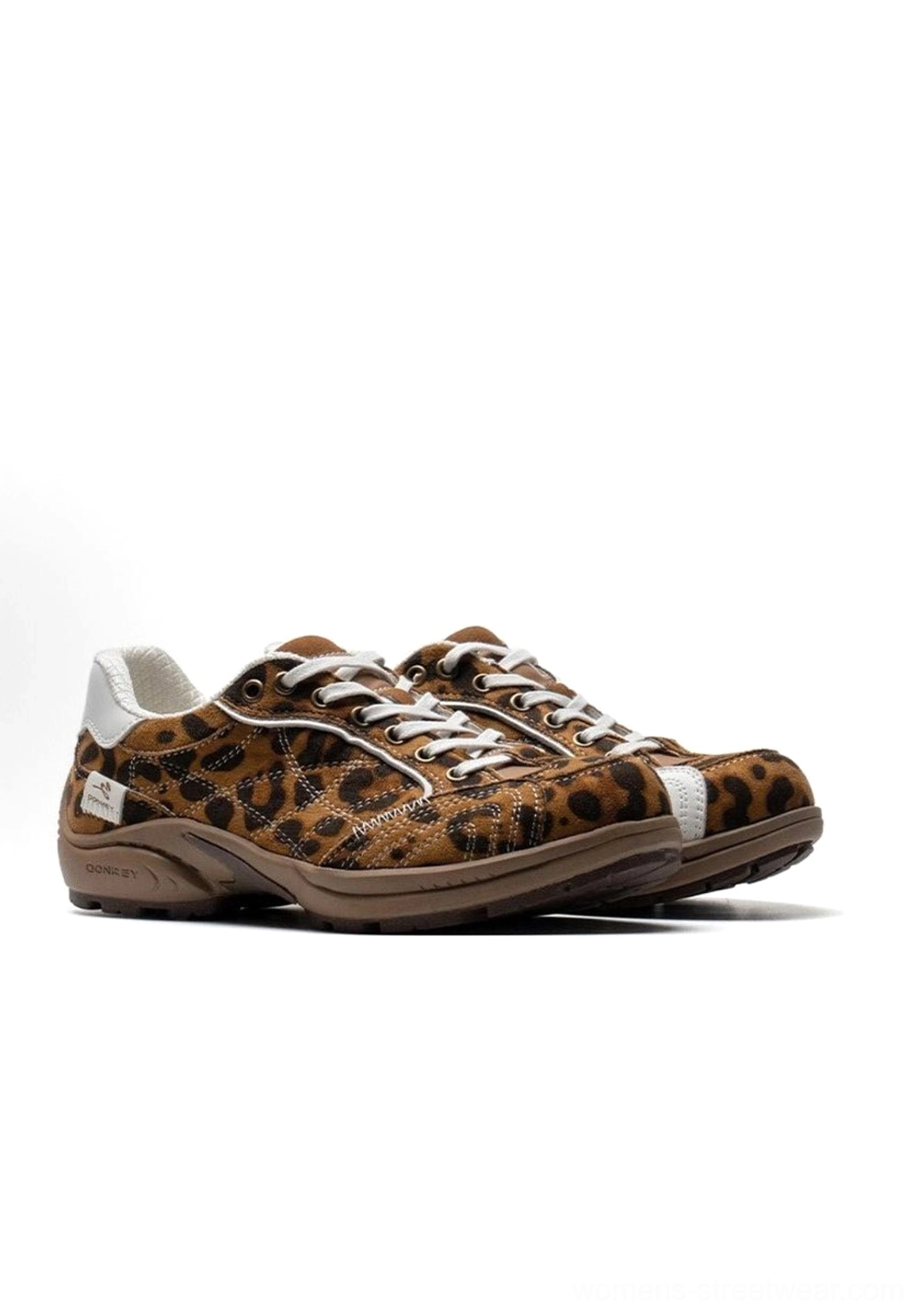 Heritage design detail shot of vintage German trainer sneaker showcasing early 2000s sportswear inspiration and historical design influence