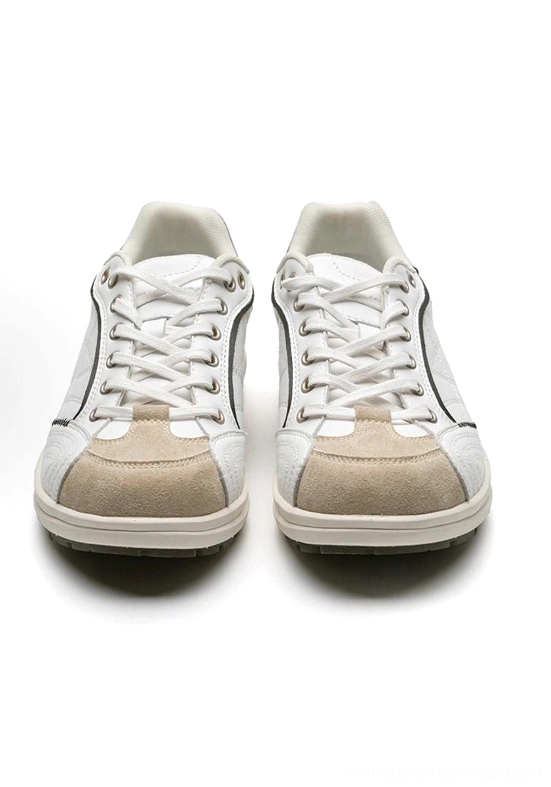 Minimalist lifestyle wear shot of vintage German trainer sneaker styled with oversized clothing and clean aesthetic for contemporary streetwear look