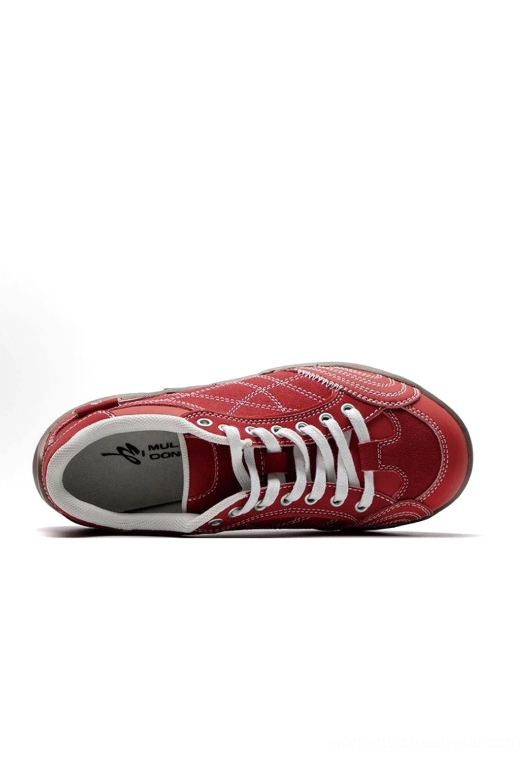Side profile product display of vintage colorblock German trainer sneaker isolated on white showing low-profile runner sole and curved paneling