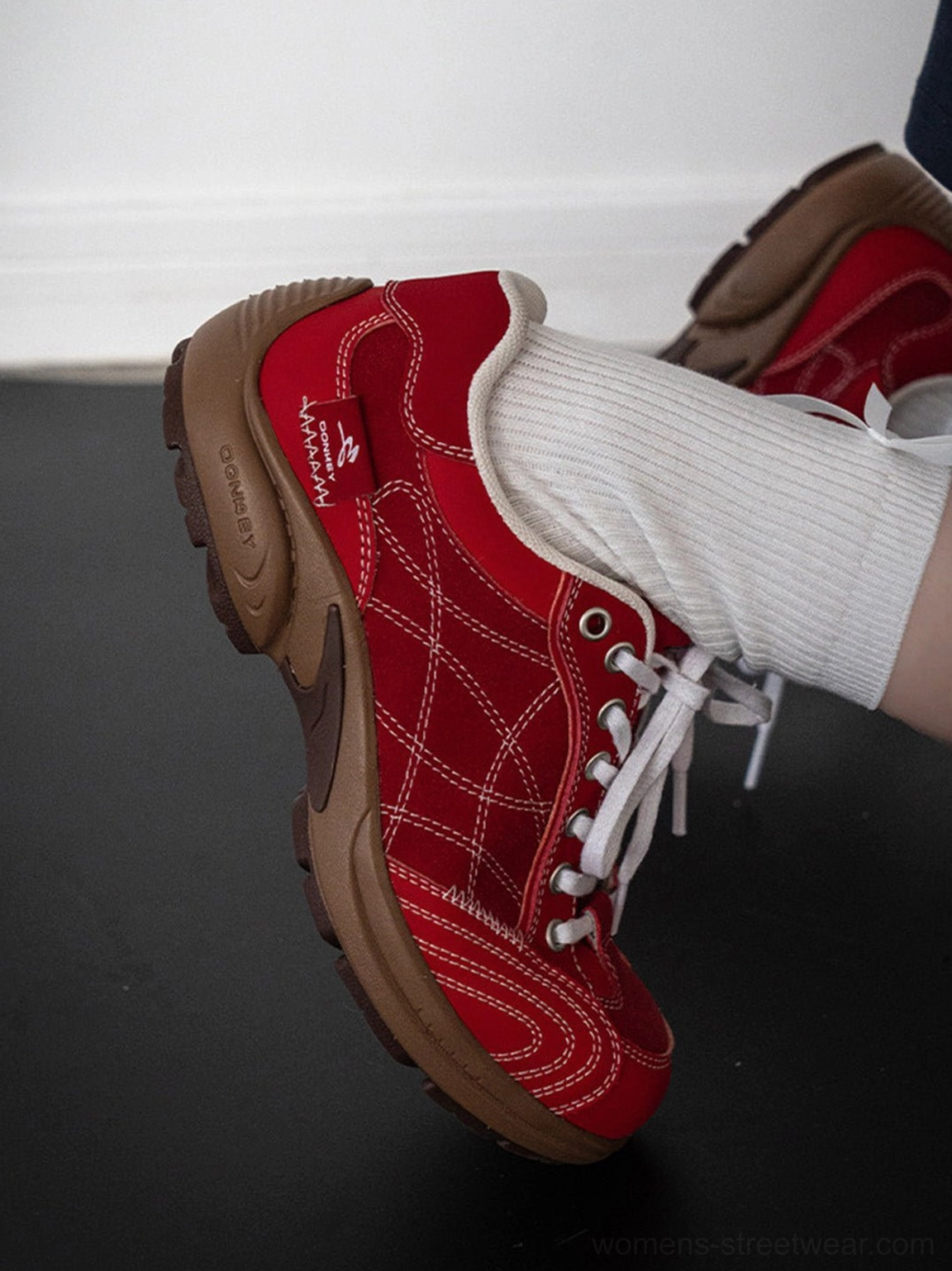 Sole detail product shot of retro German trainer sneaker displaying vintage runner sole construction stitching pattern and outsole grip texture