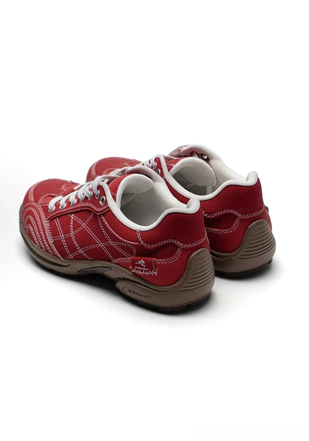 Toe cap area close-up product photography of vintage colorblock German trainer showing stitched construction and synthetic overlay durability