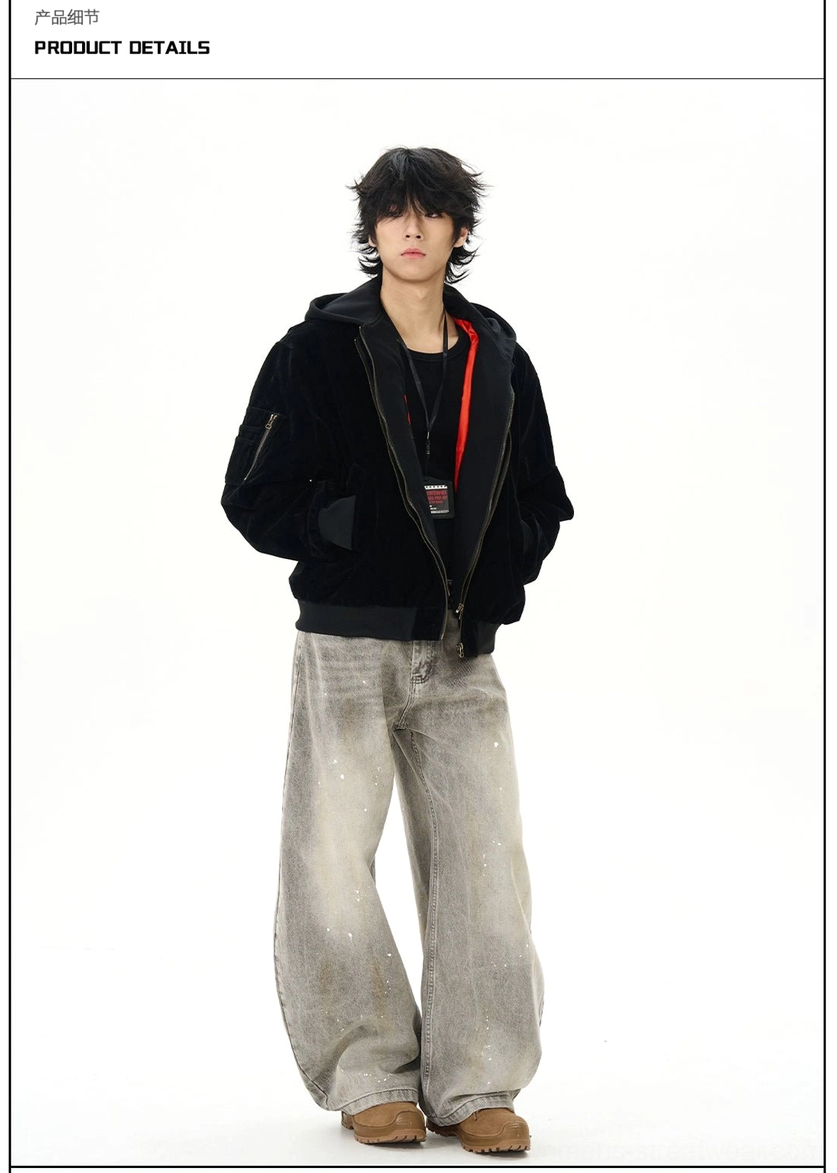 Three quarter view of male model styling vintage gray paint splatter wide leg streetwear jeans