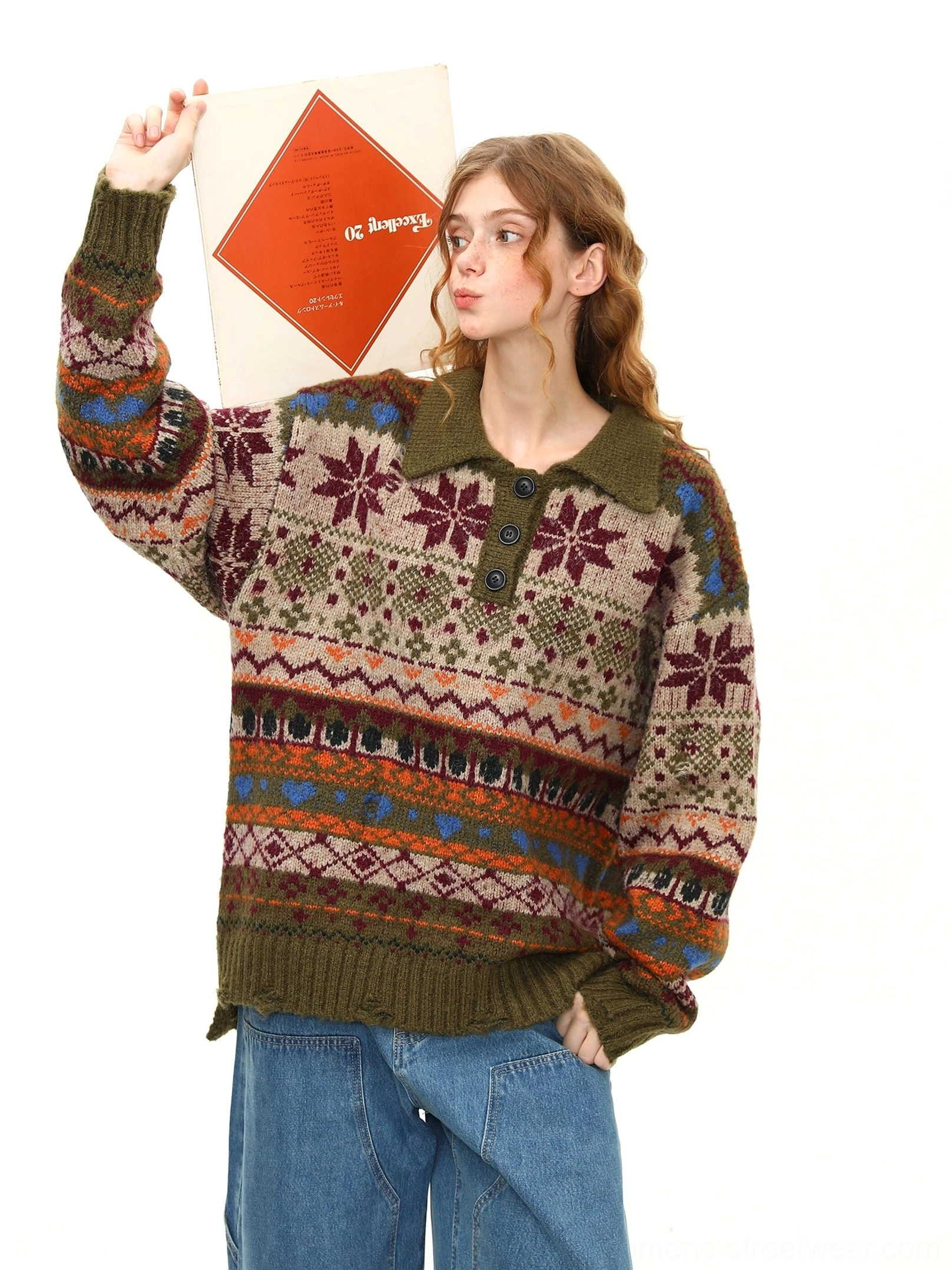 Low-angle front view of a vintage green Fair Isle polo sweater with ribbed collar, three-button neckline, and warm winter snowflake pattern